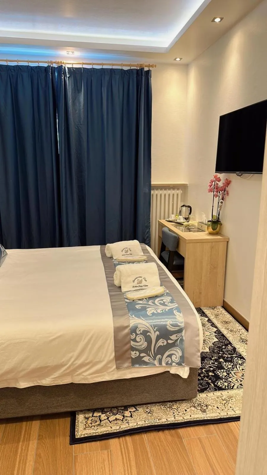 Bed in hotel whiteswan