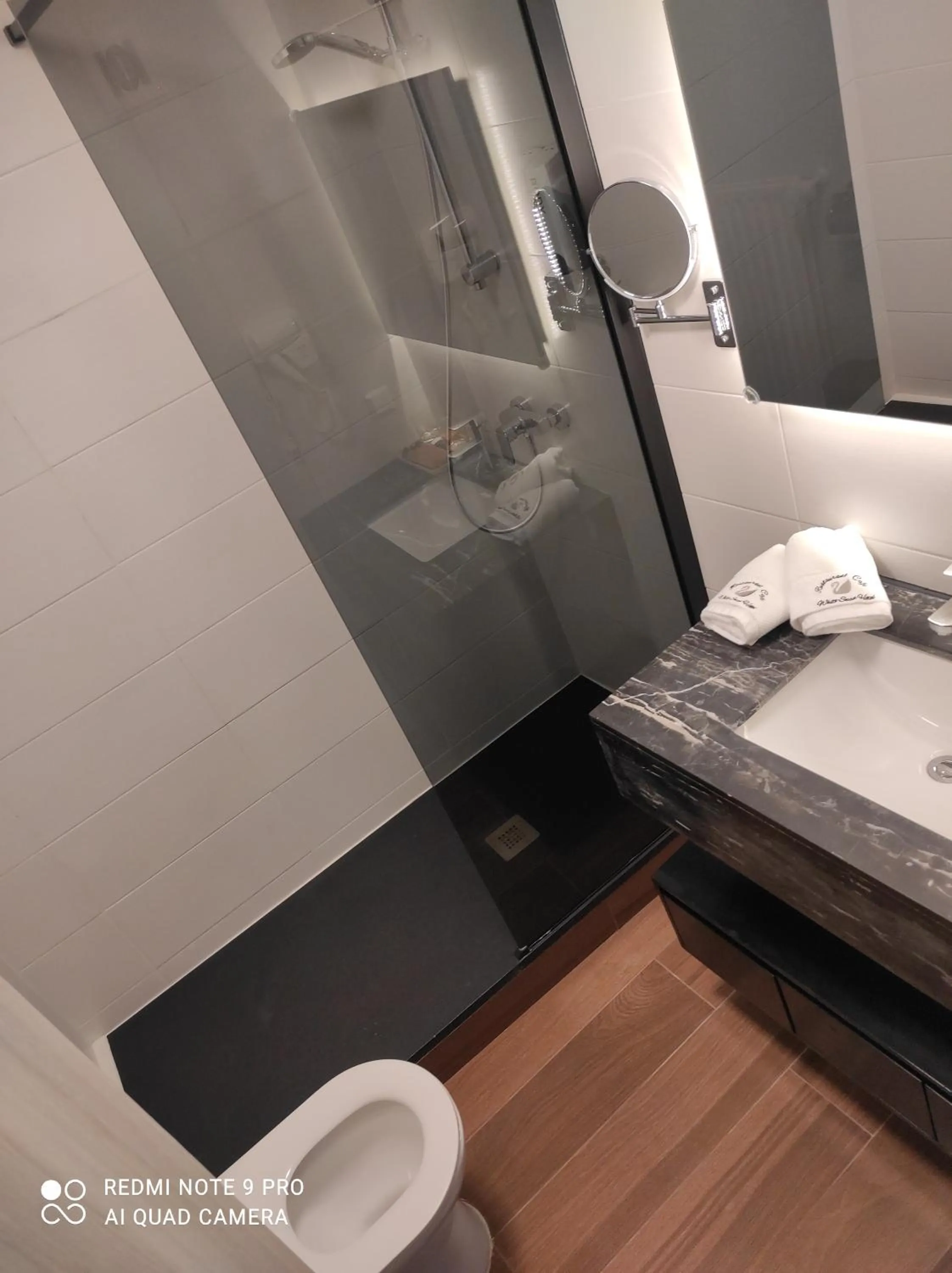 Shower, Bed in hotel whiteswan