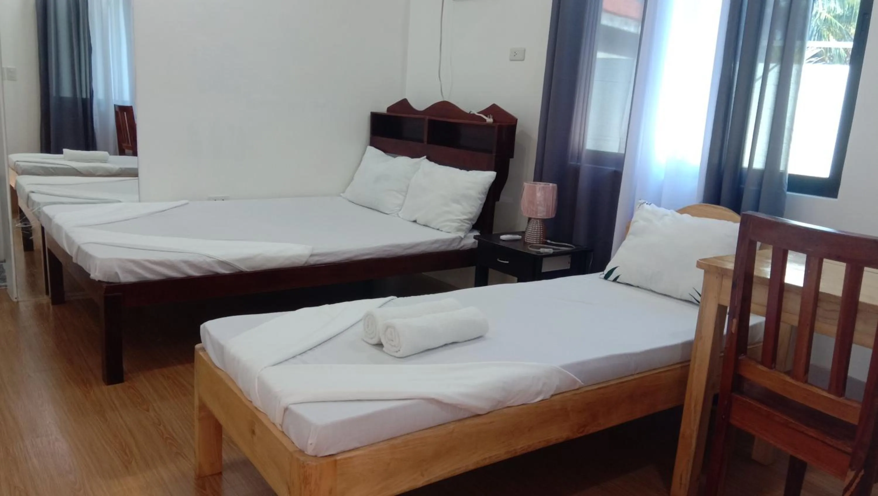 Bed in RNA Guesthouse