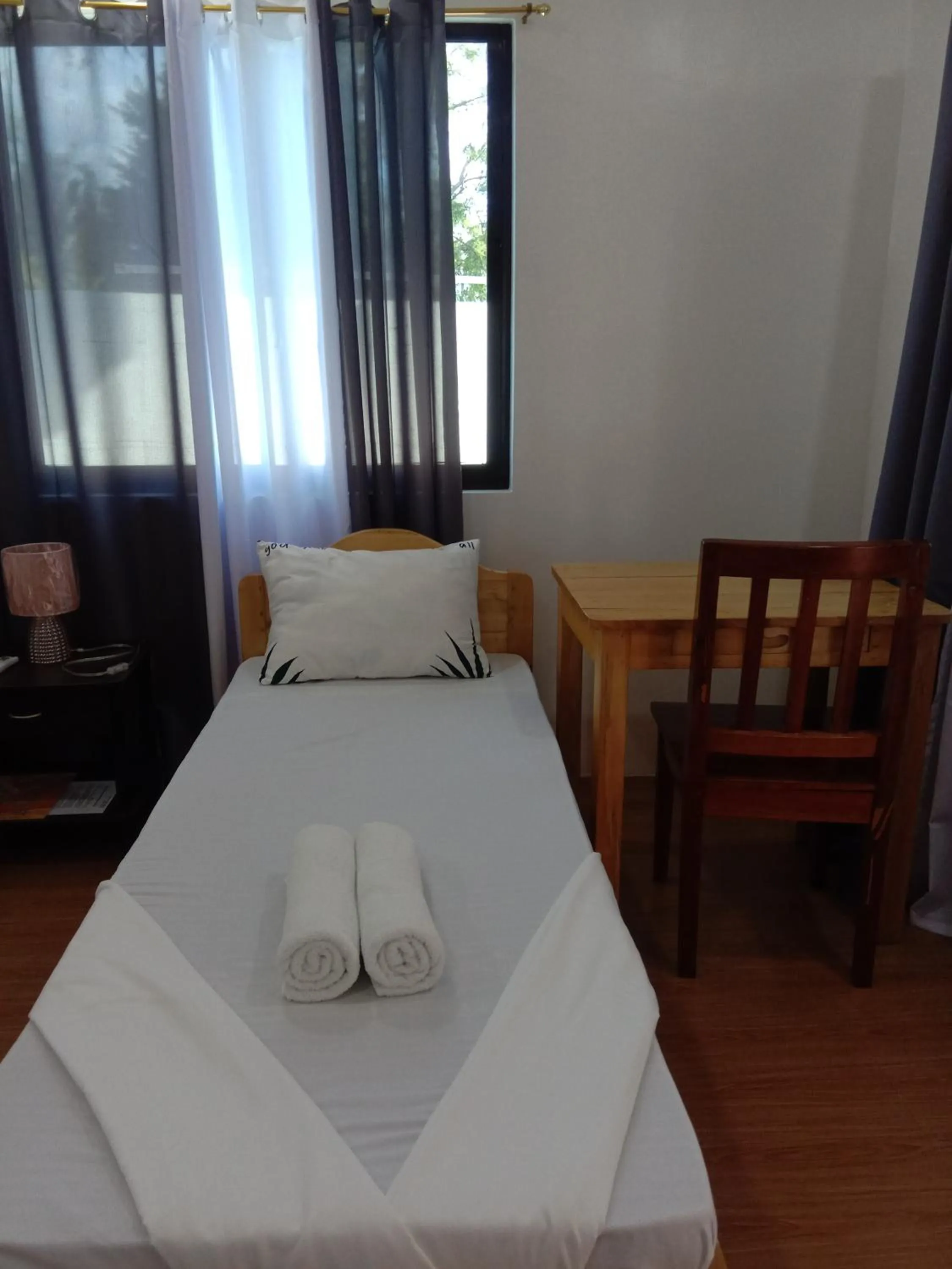 Bed in RNA Guesthouse