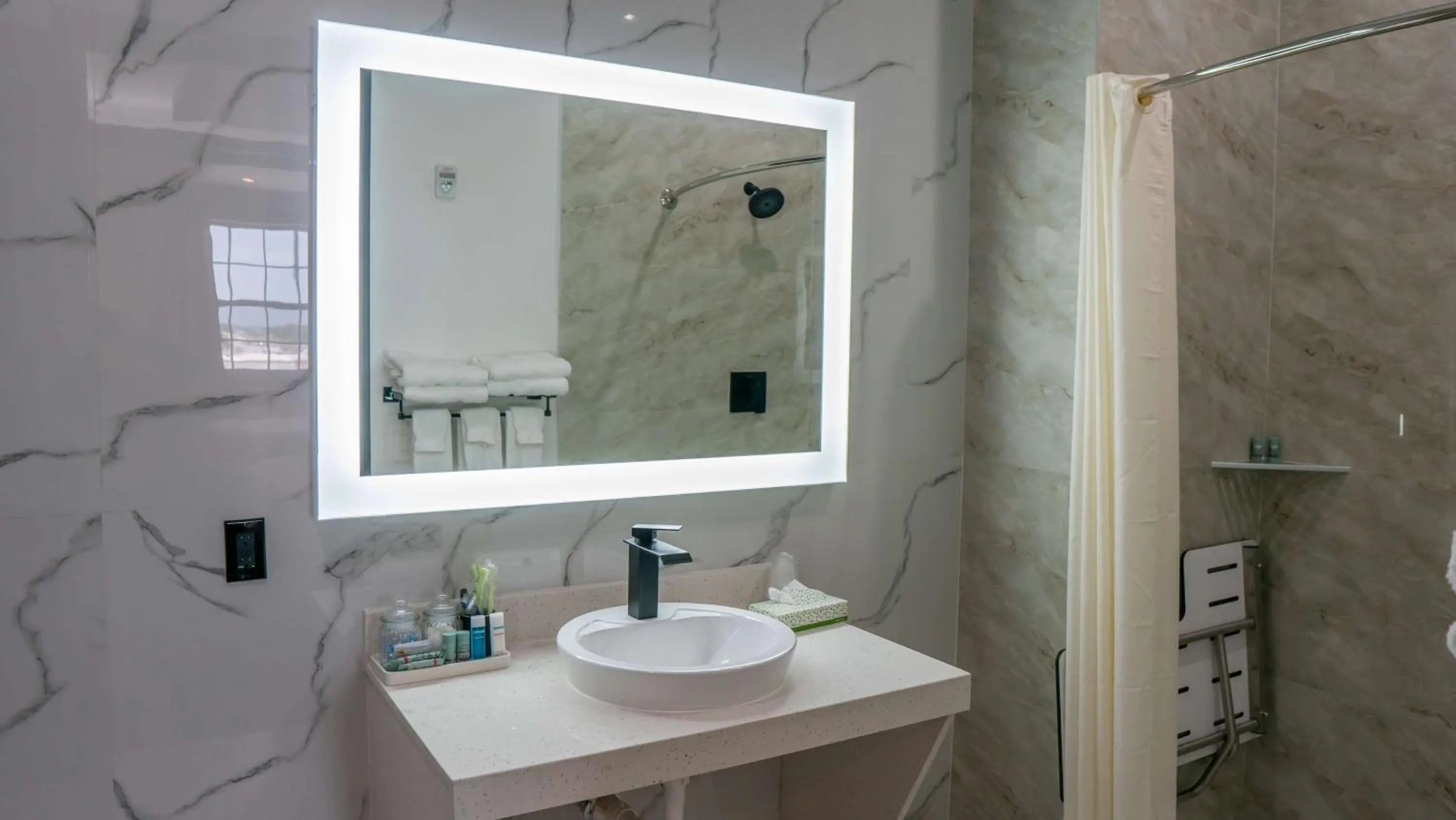 Bathroom in Comfeeni Inn and Suites