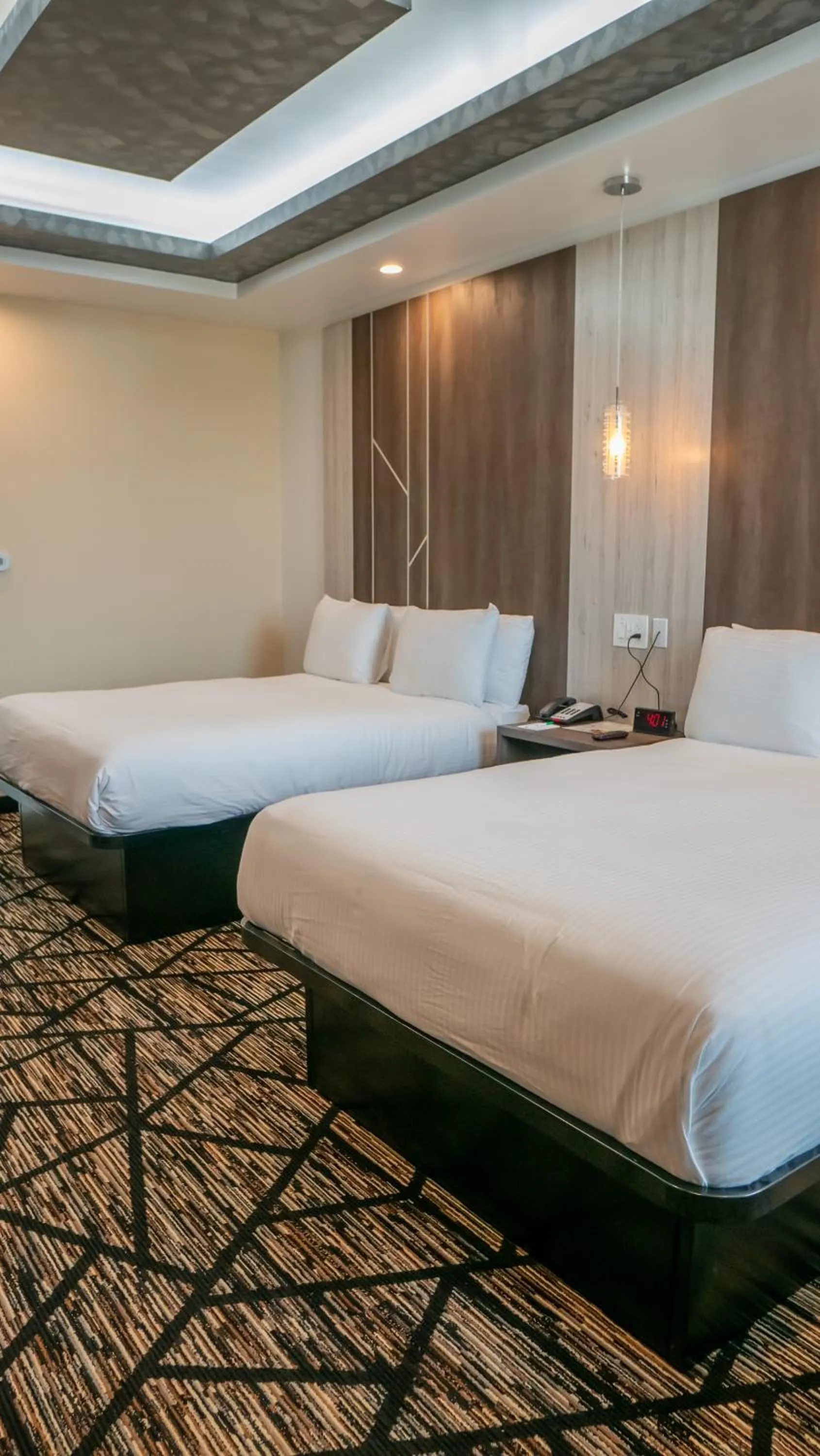 Bedroom, Bed in Comfeeni Inn and Suites