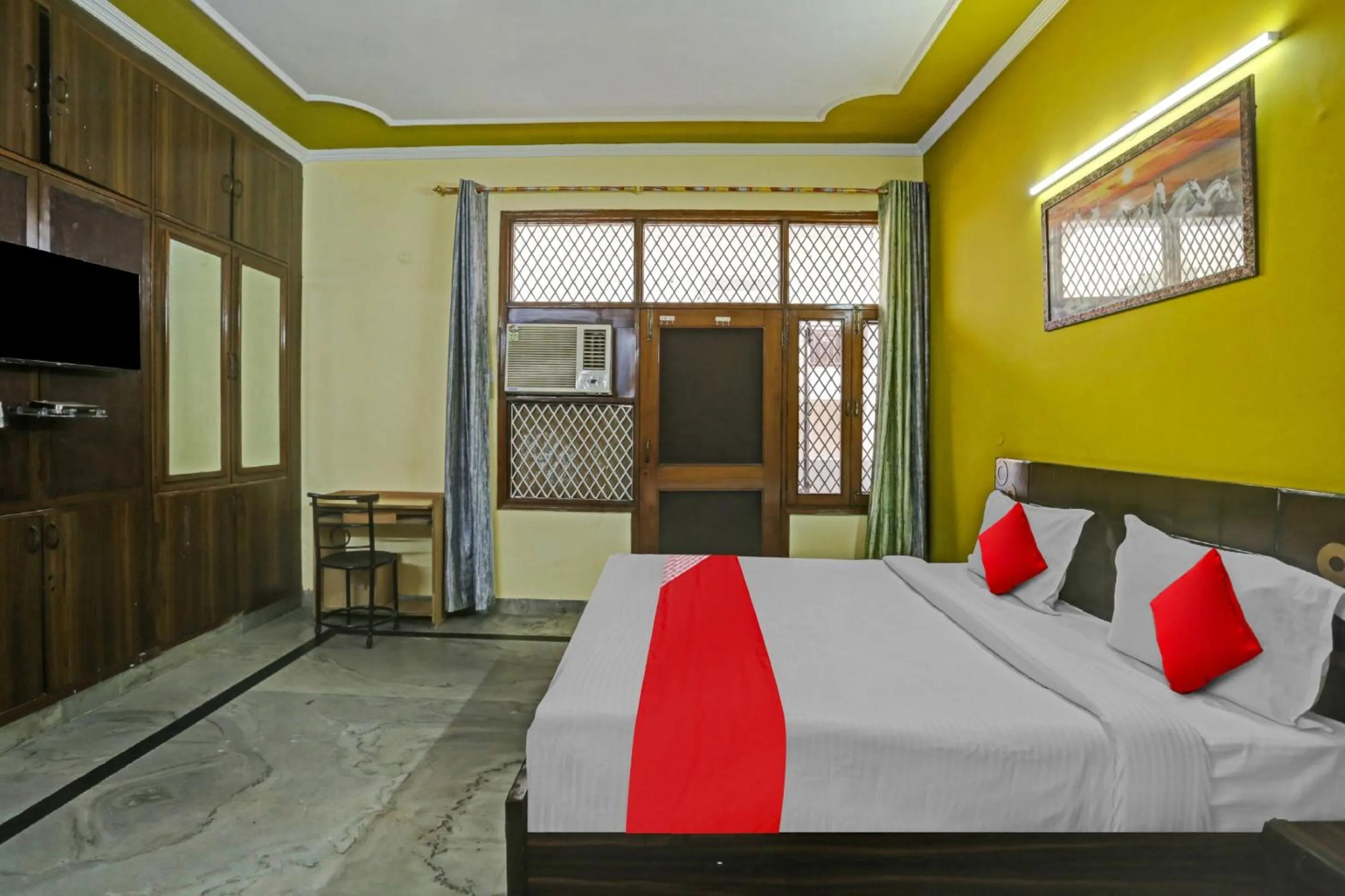 Bedroom in OYO Flagship 81046 Royal Retreat
