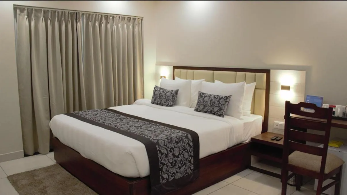 Bed in Pride Biznotel Canopus, Digha