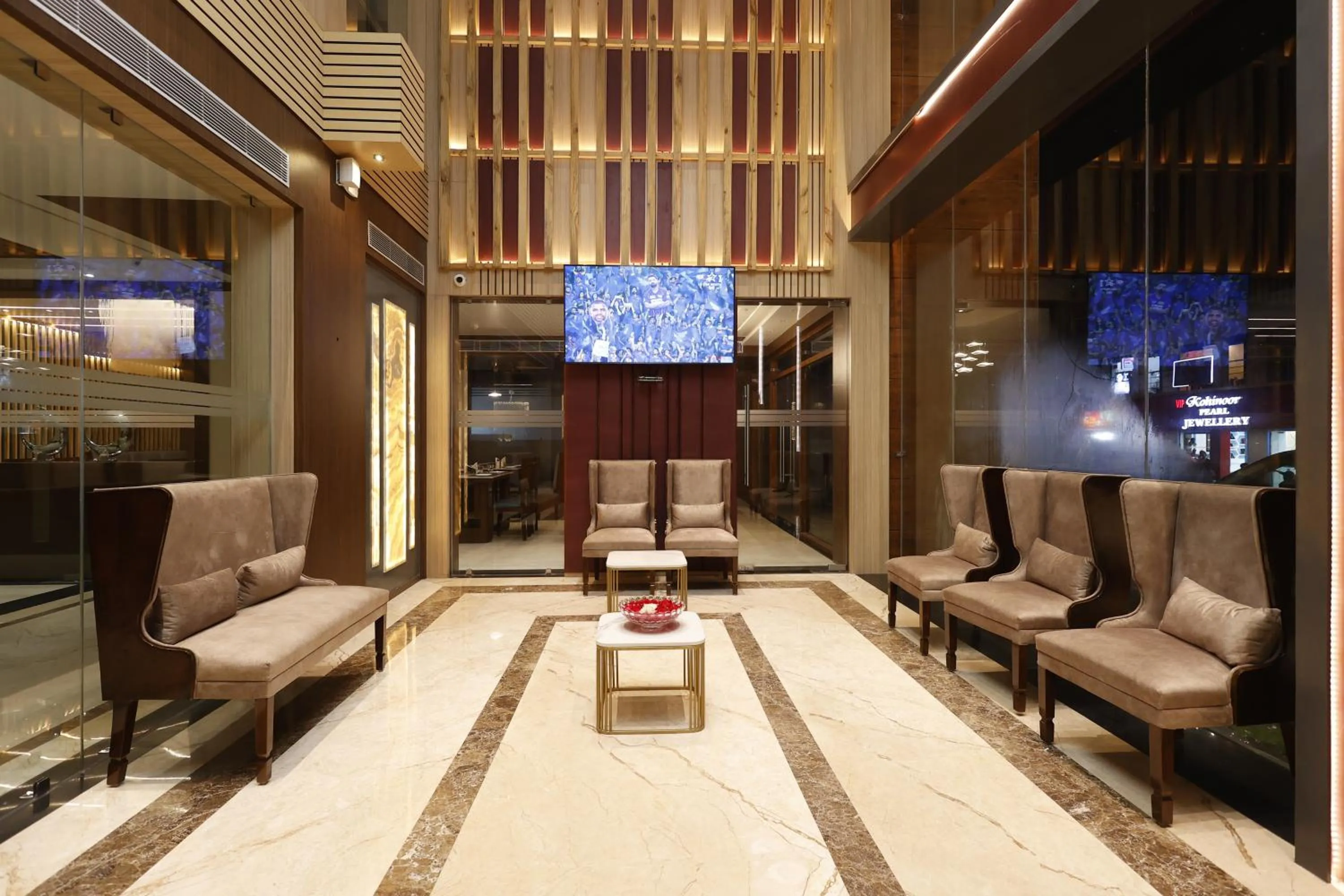 Seating area in Pride Biznotel Canopus, Digha