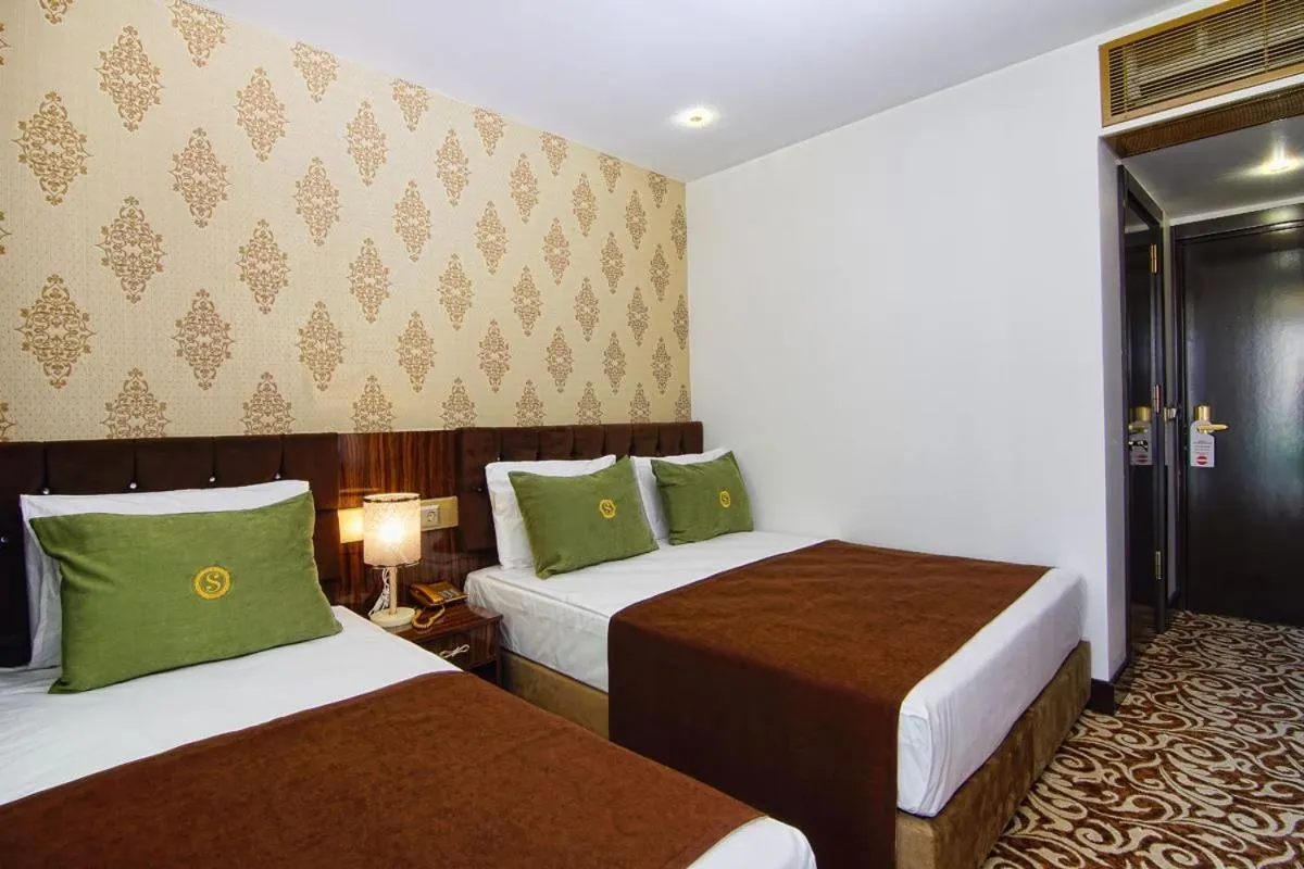 Bed in HOTEL S WHITE