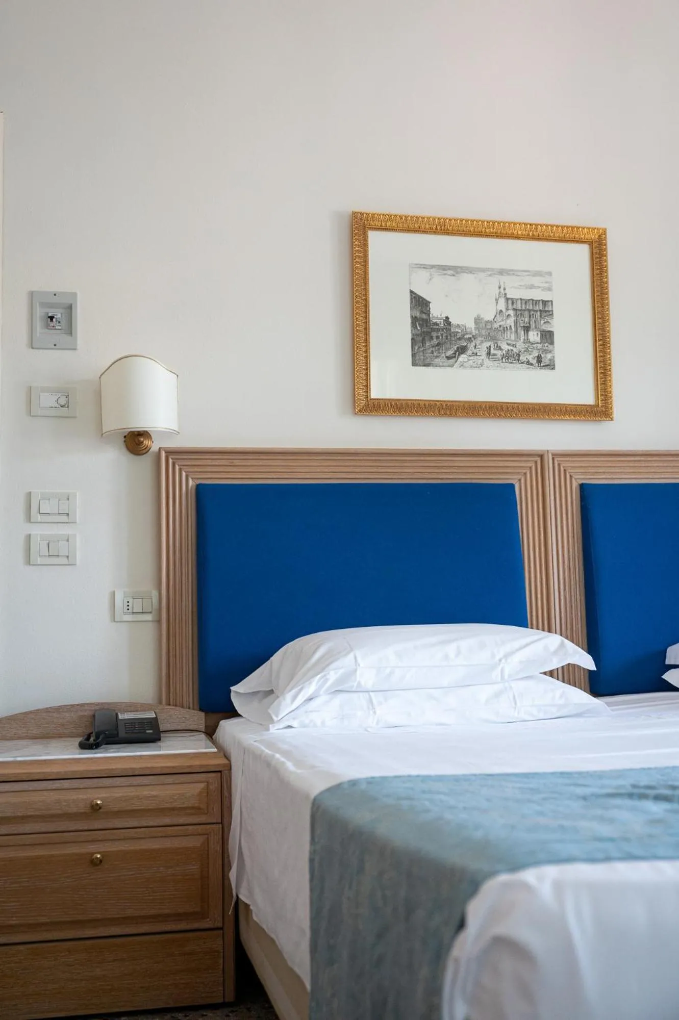 Decorative detail, Bed in La Dépendance by Casa Bianca