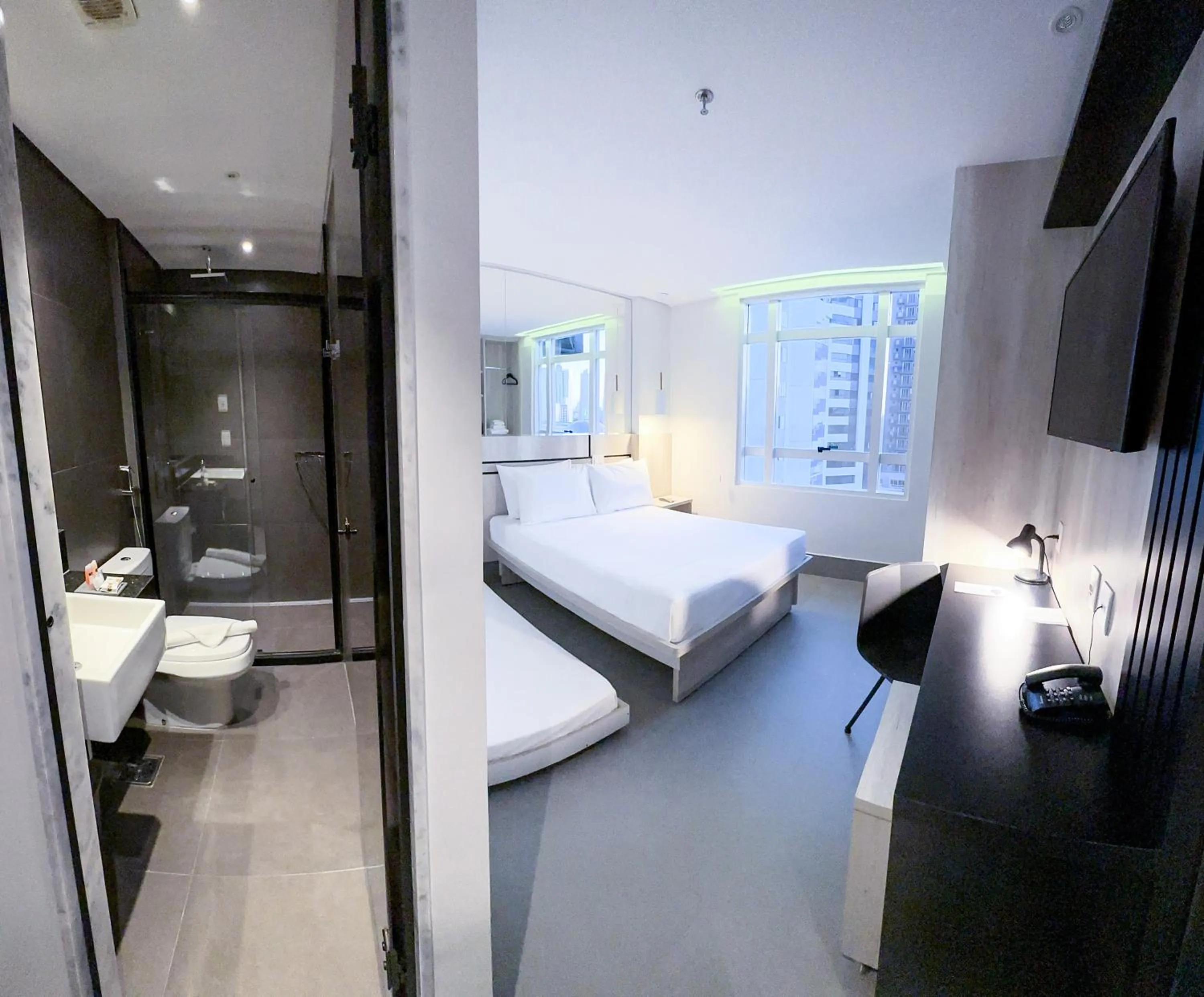 Bed in Hotel Black Inn Flamboyant