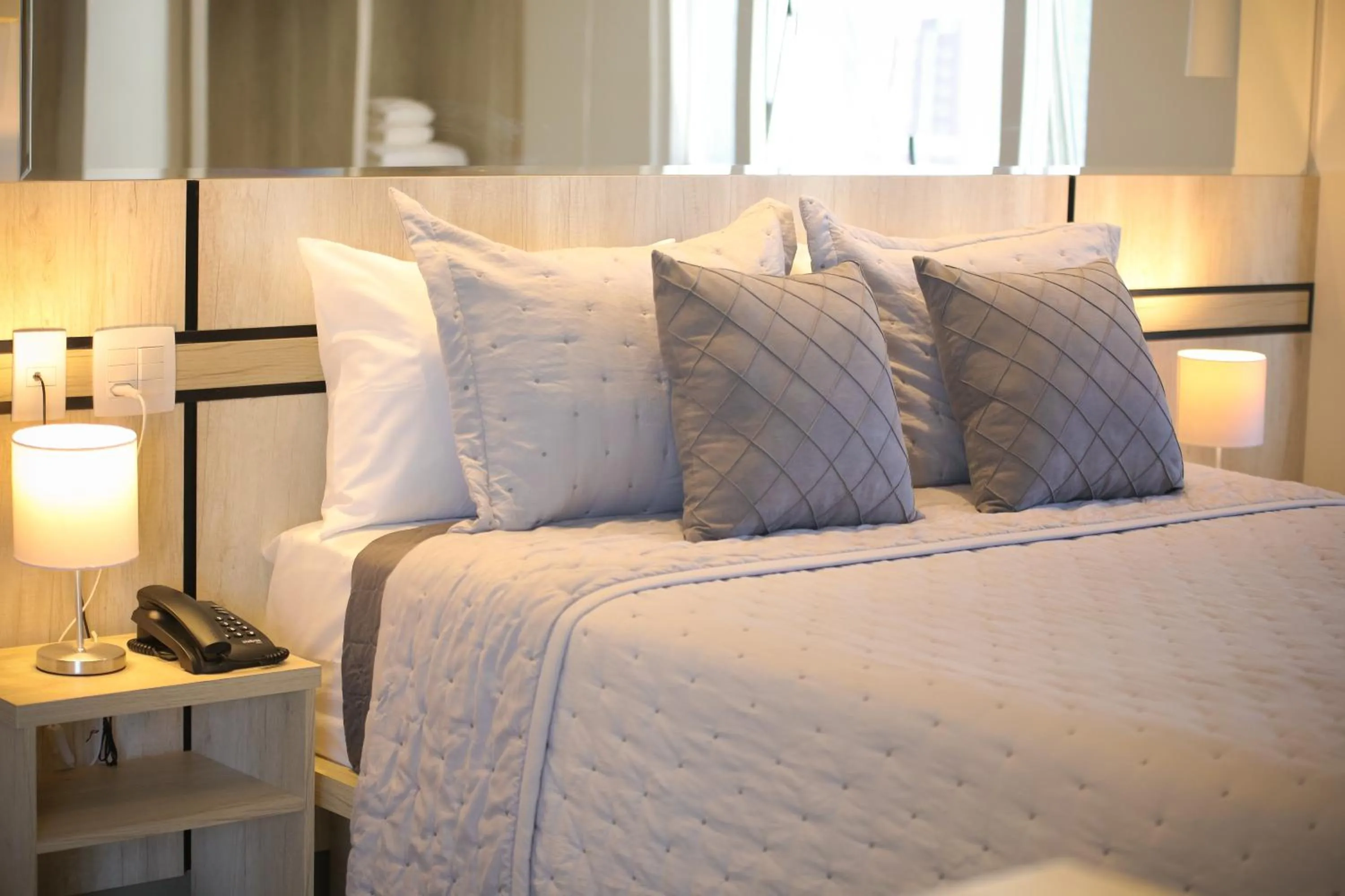 Bed in Hotel Black Inn Flamboyant