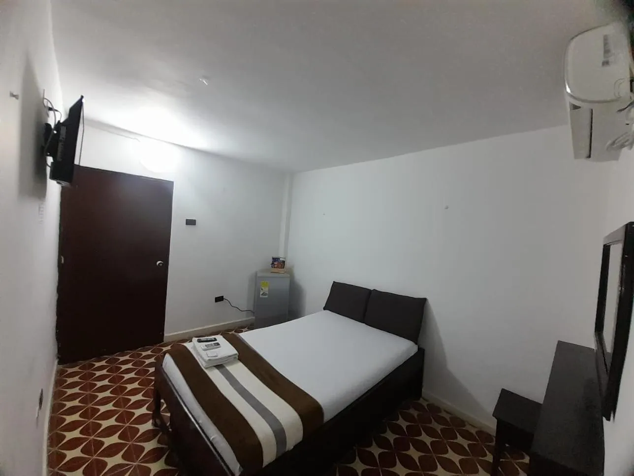 Bed in Hotel Tamaiti