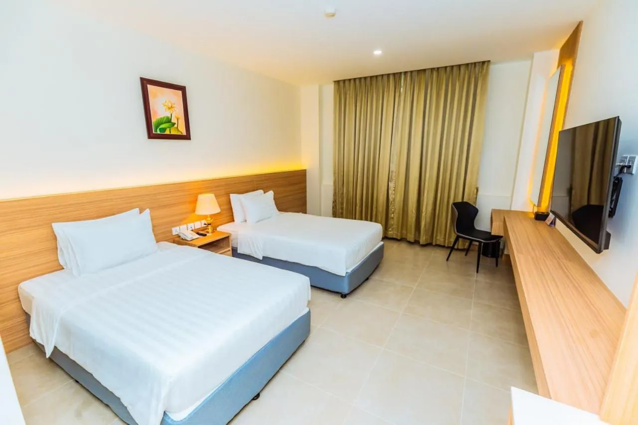 Bed in Dynasty Casino Hotel