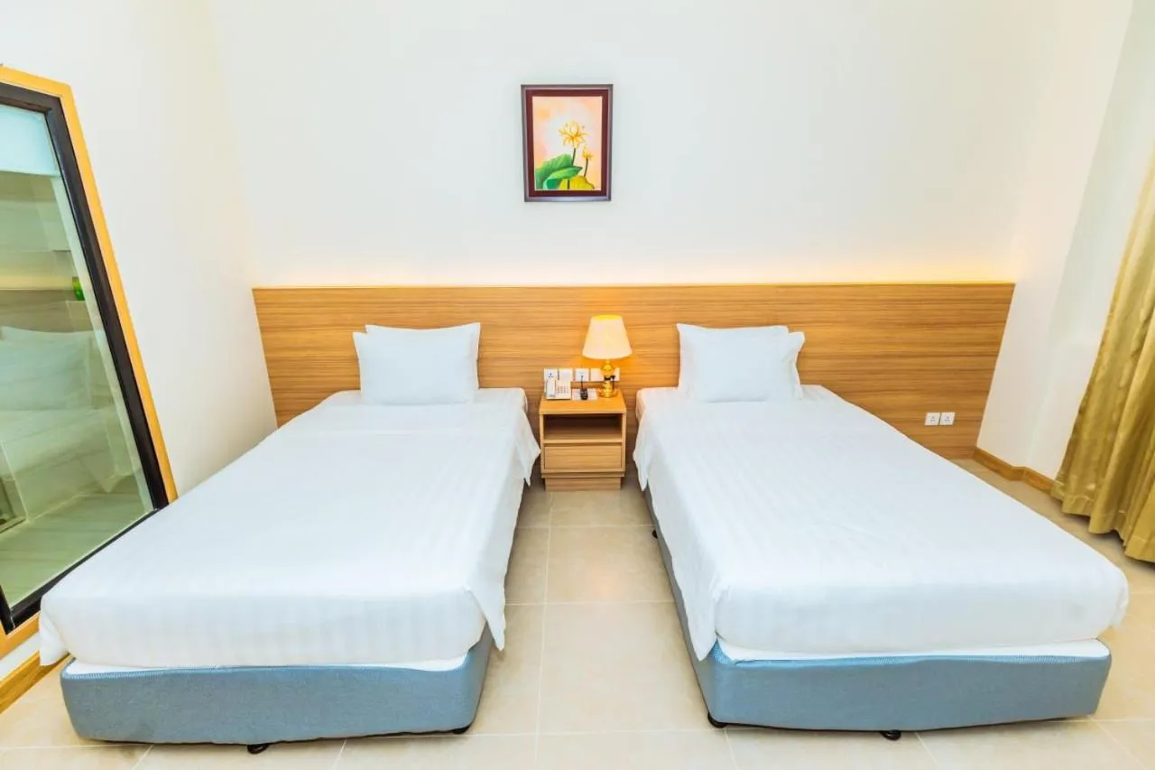 Bed in Dynasty Casino Hotel