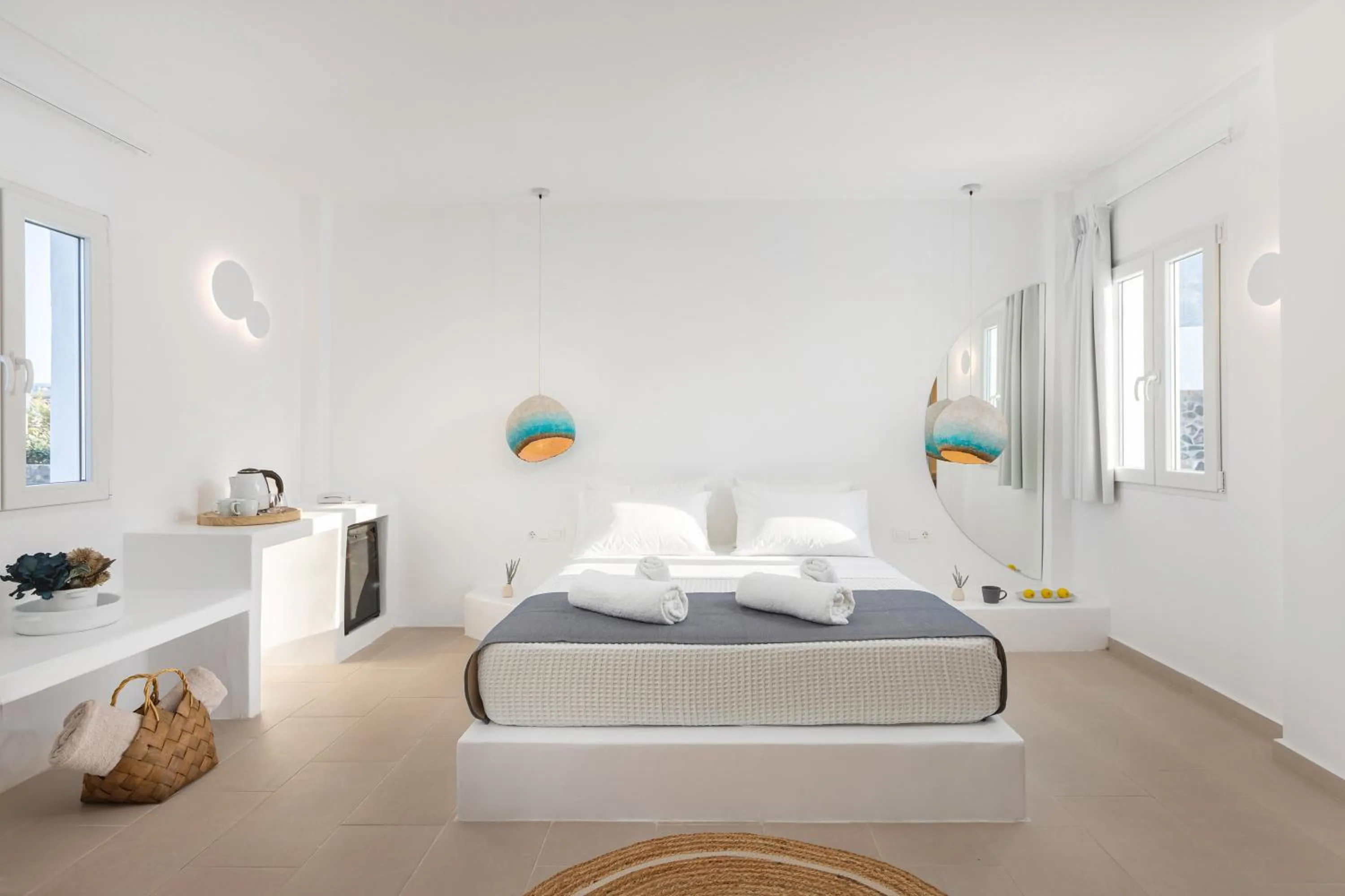 Bed in VOCA HOTEL & SUITES