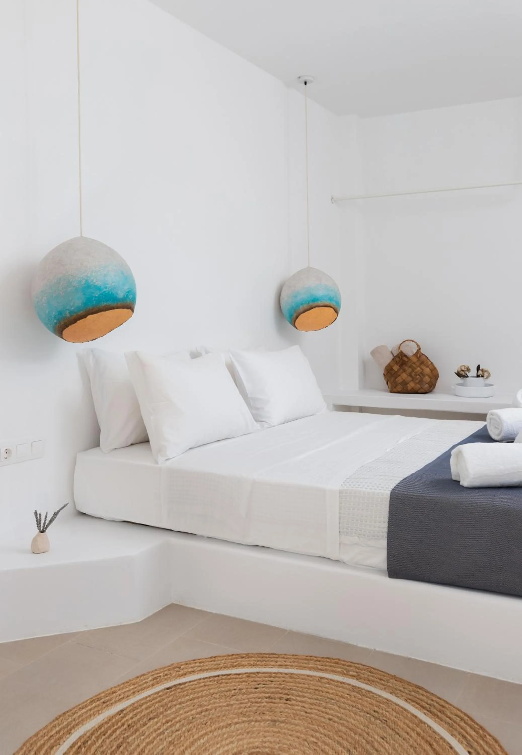 Bed in VOCA HOTEL & SUITES