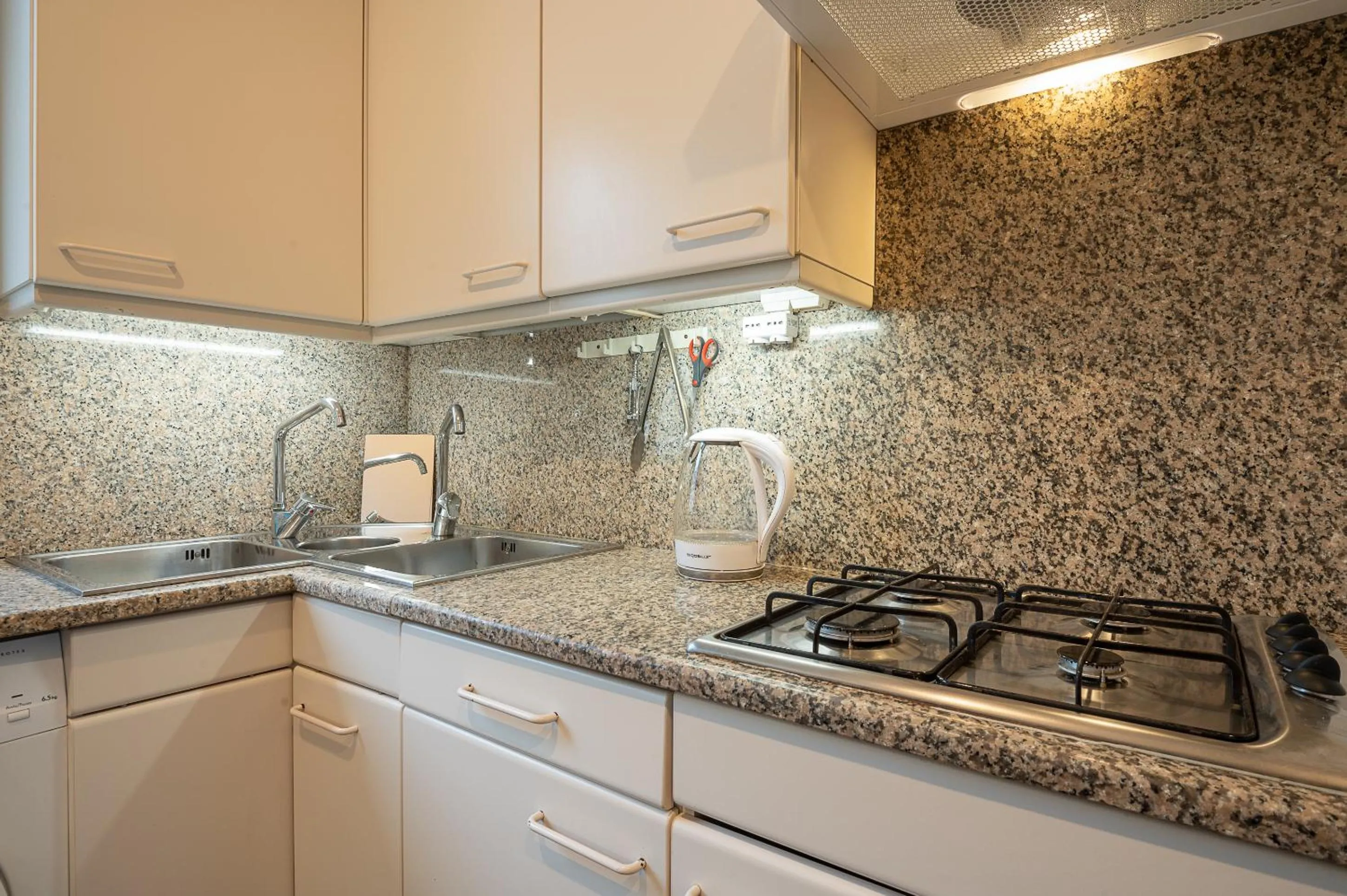 Kitchen or kitchenette in Tiffany's apartment Flaminio