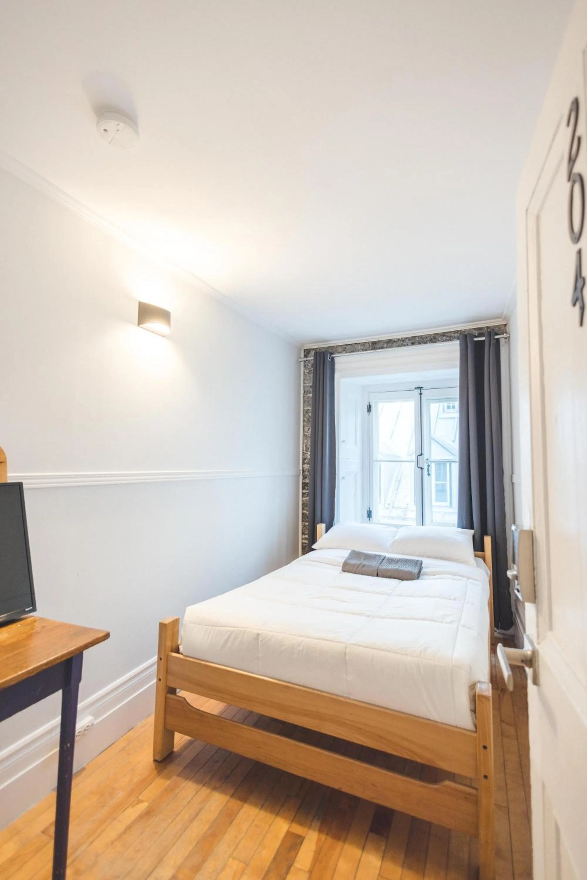 Bed in Auberge de la Paix