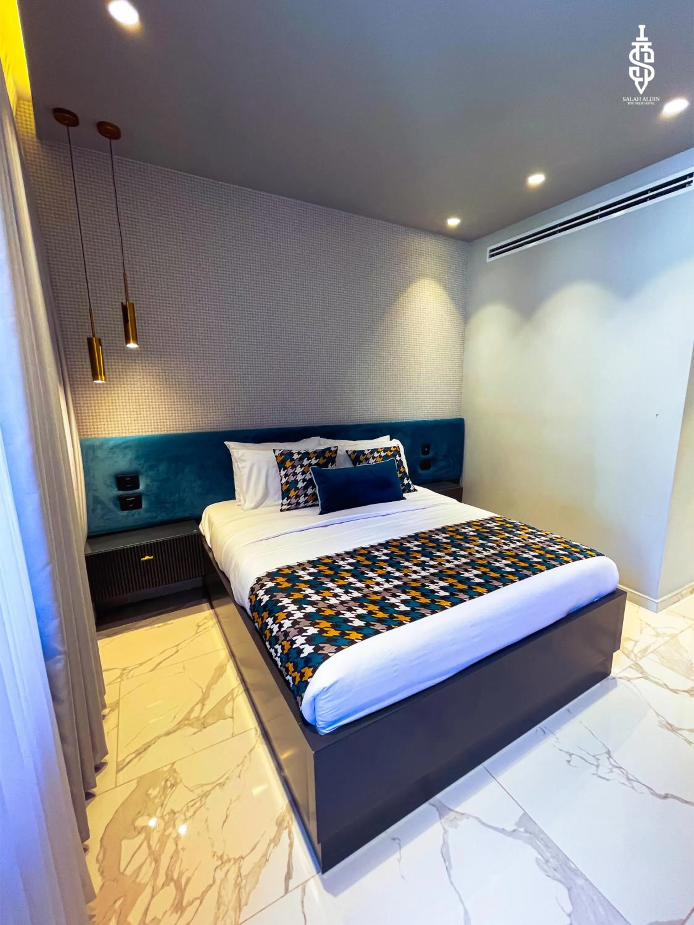 Bed in Saladin Boutique Hotel