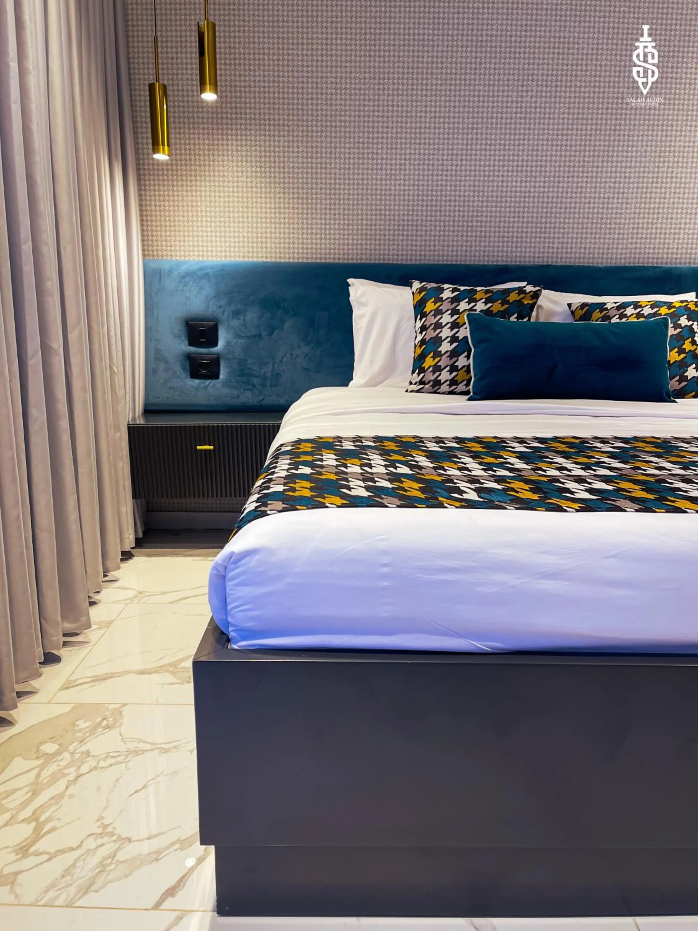 Bed in Saladin Boutique Hotel