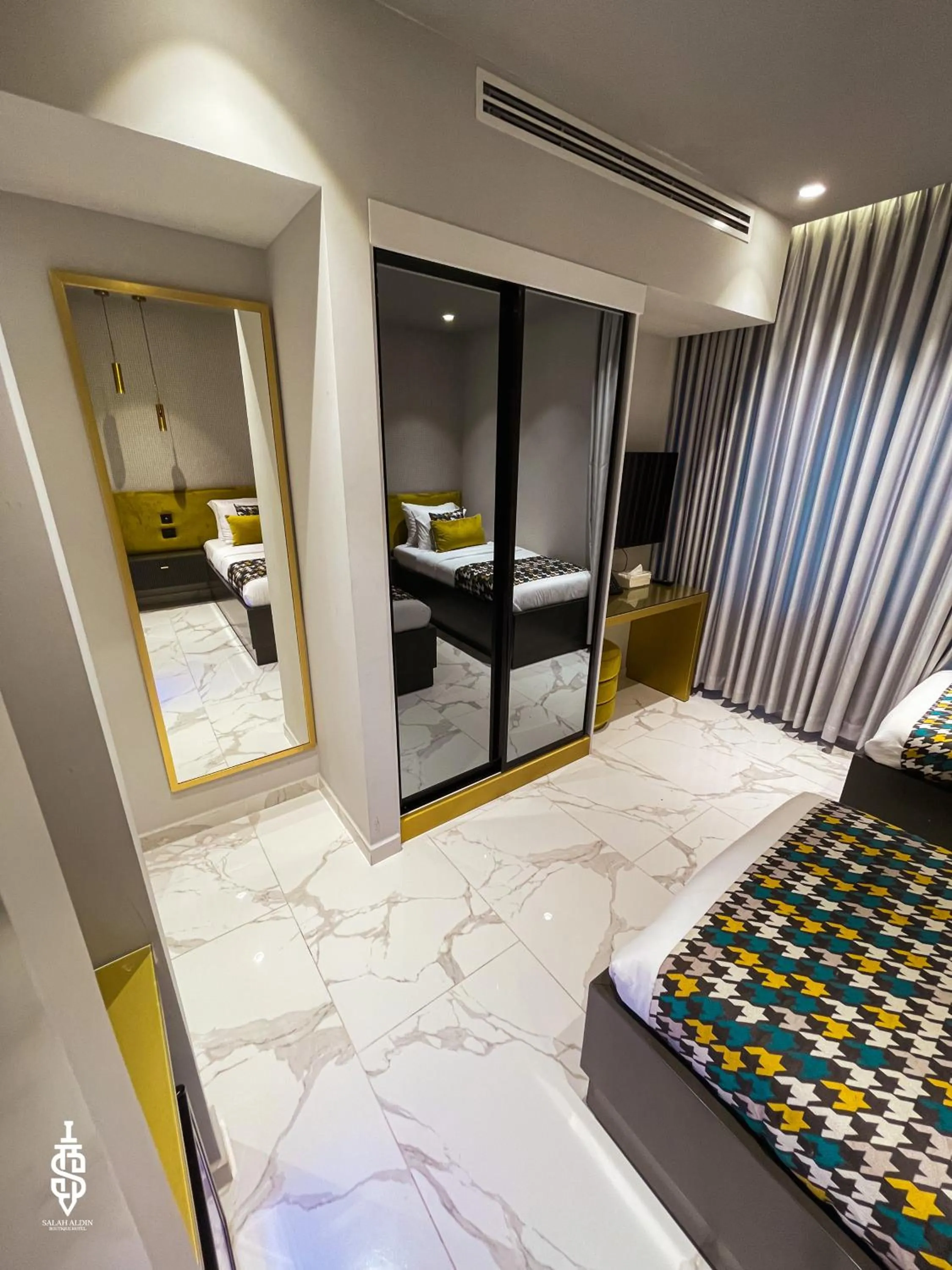 Bed in Saladin Boutique Hotel