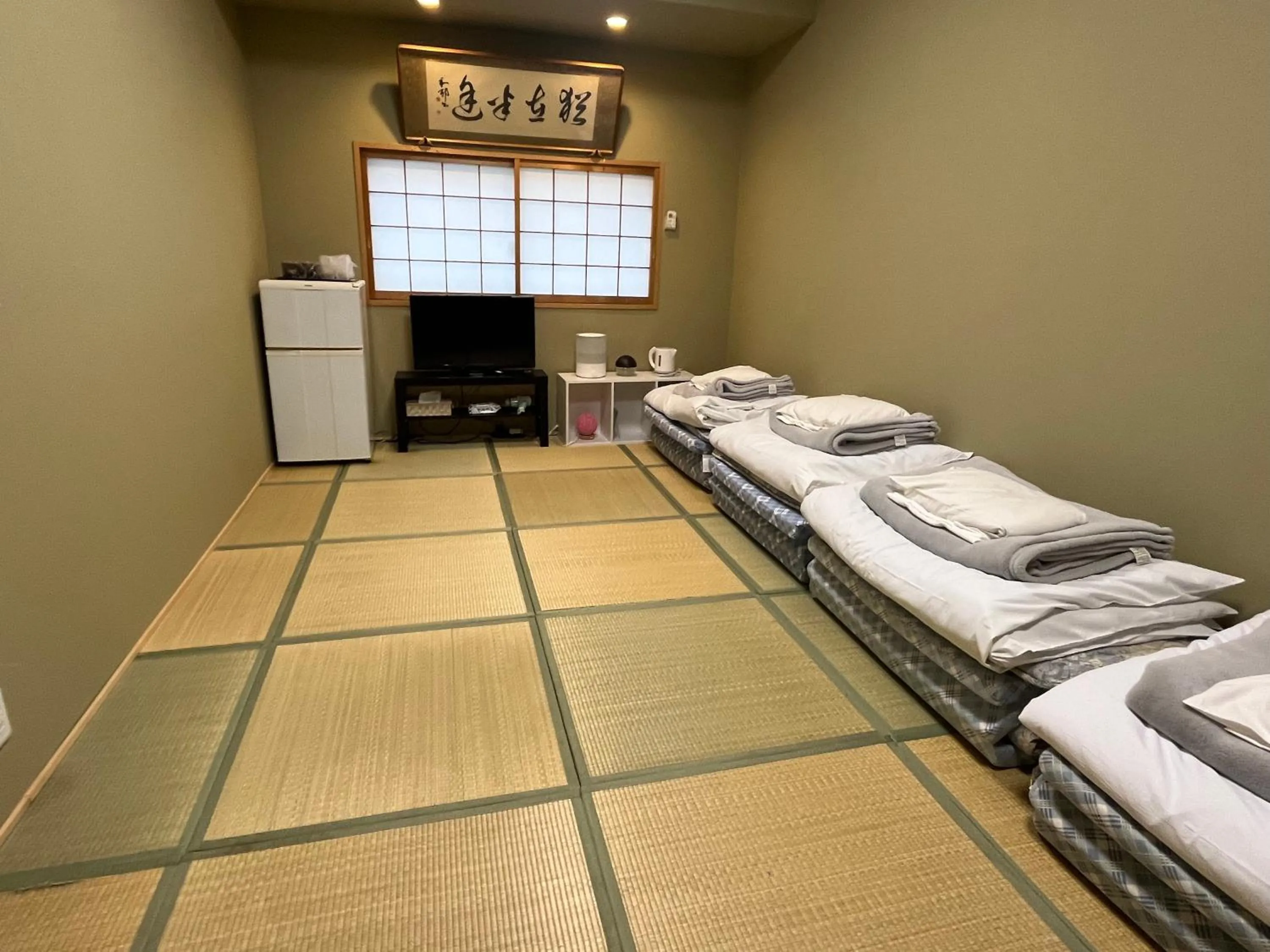 Bed in Wafu Ryokan Uehonmachi