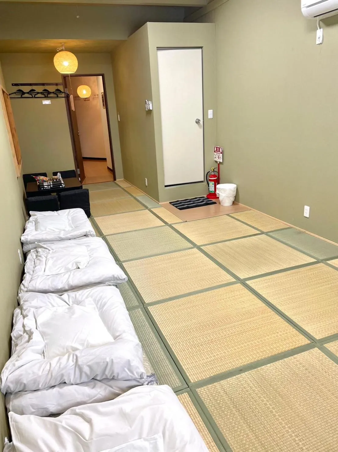 Bed in Wafu Ryokan Uehonmachi