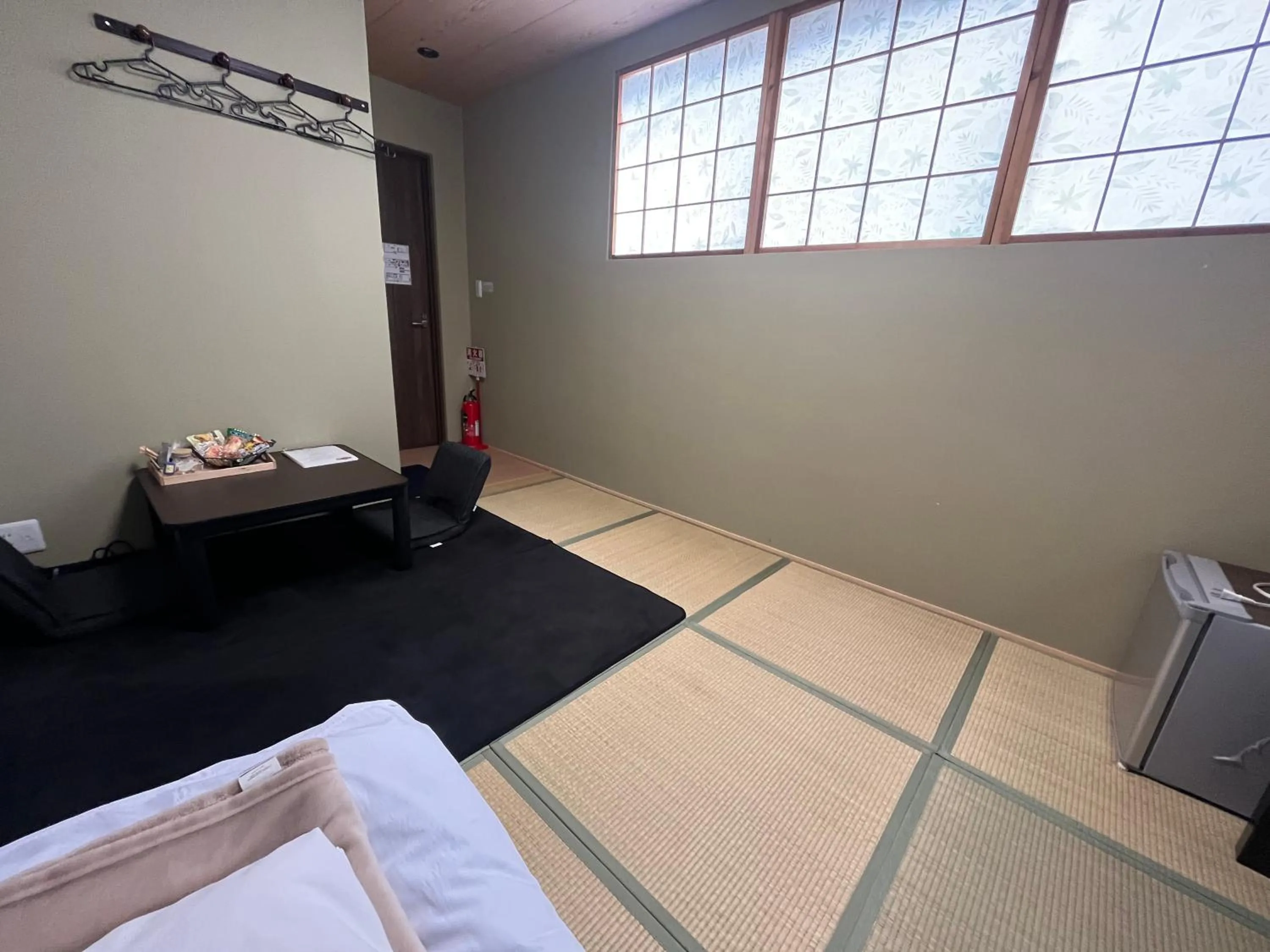 Bed in Wafu Ryokan Uehonmachi