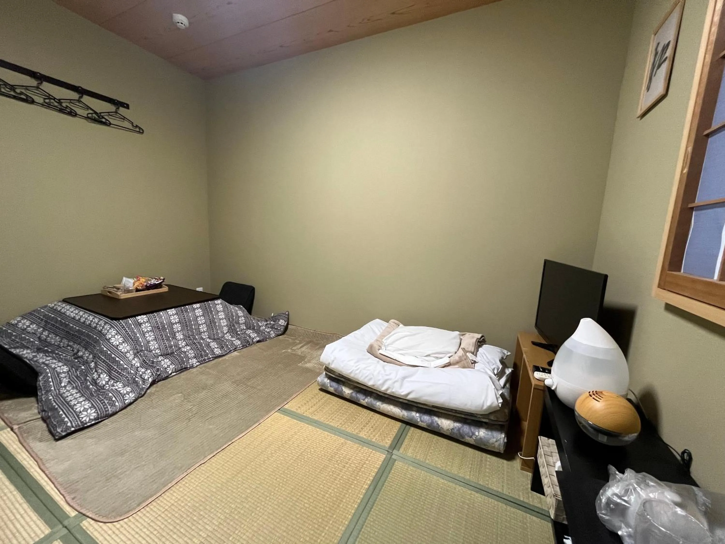 Bed in Wafu Ryokan Uehonmachi