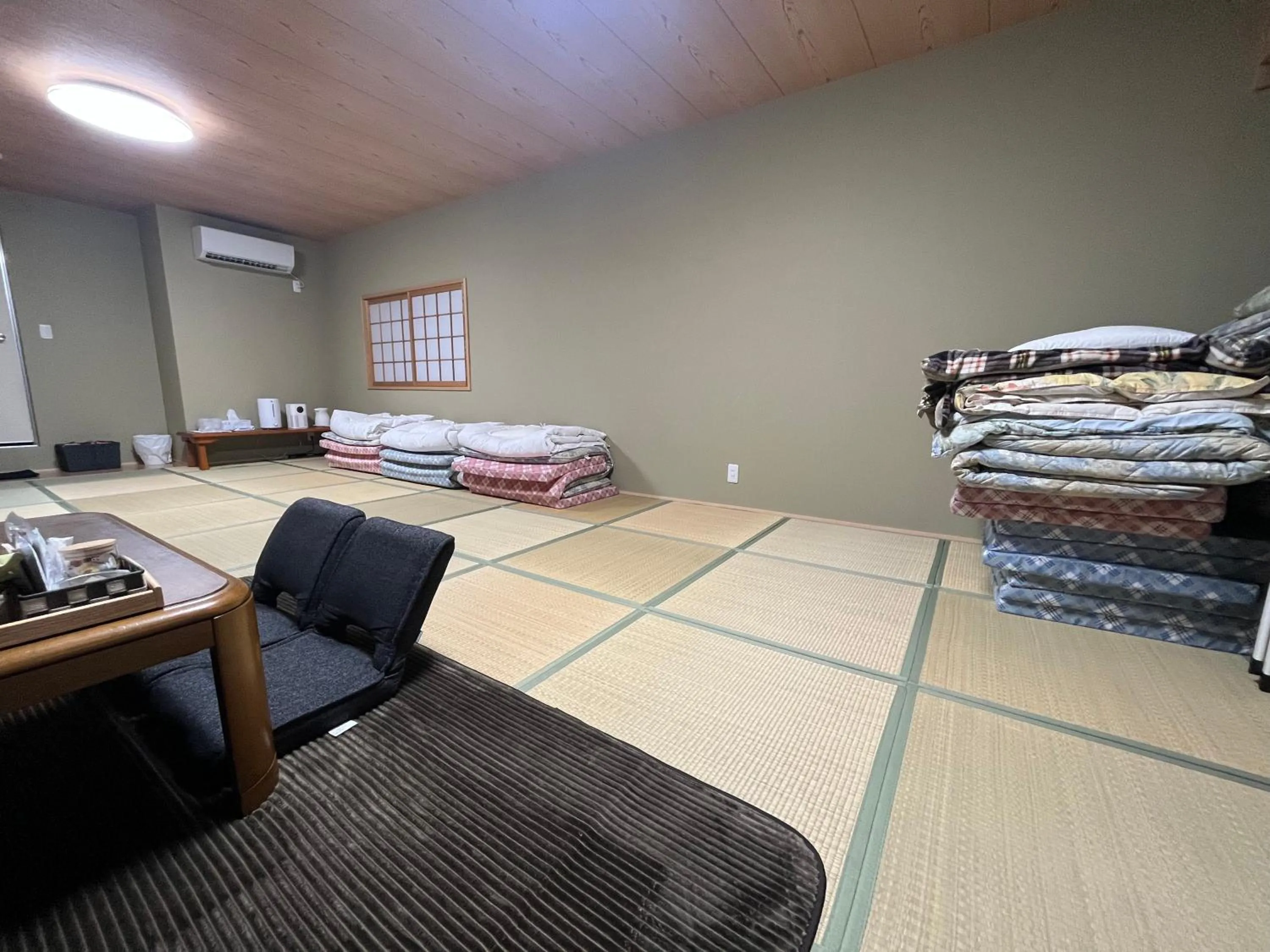 Bed in Wafu Ryokan Uehonmachi