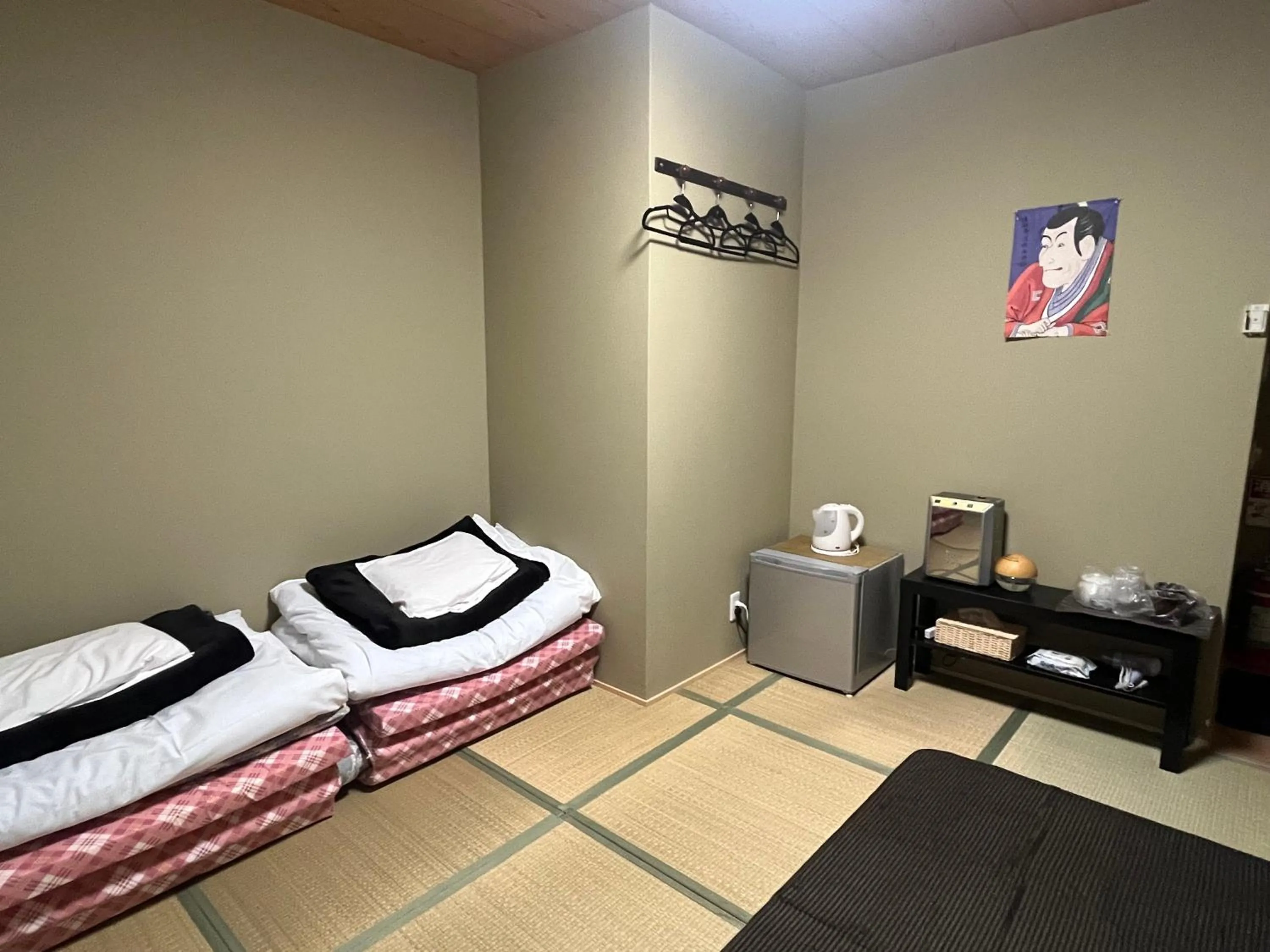 Bed in Wafu Ryokan Uehonmachi