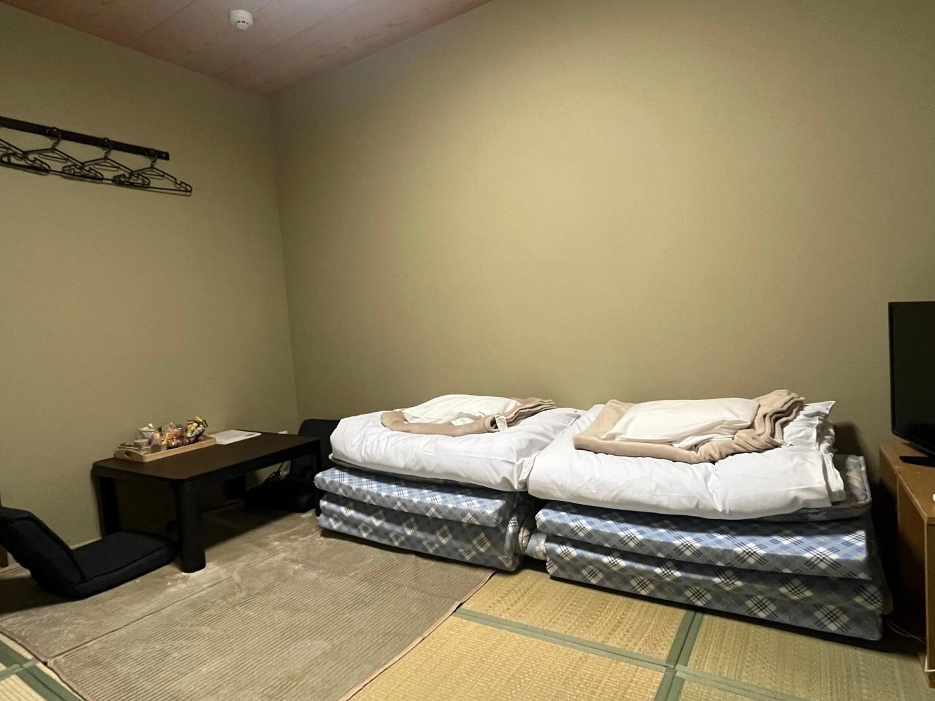 Bed in Wafu Ryokan Uehonmachi