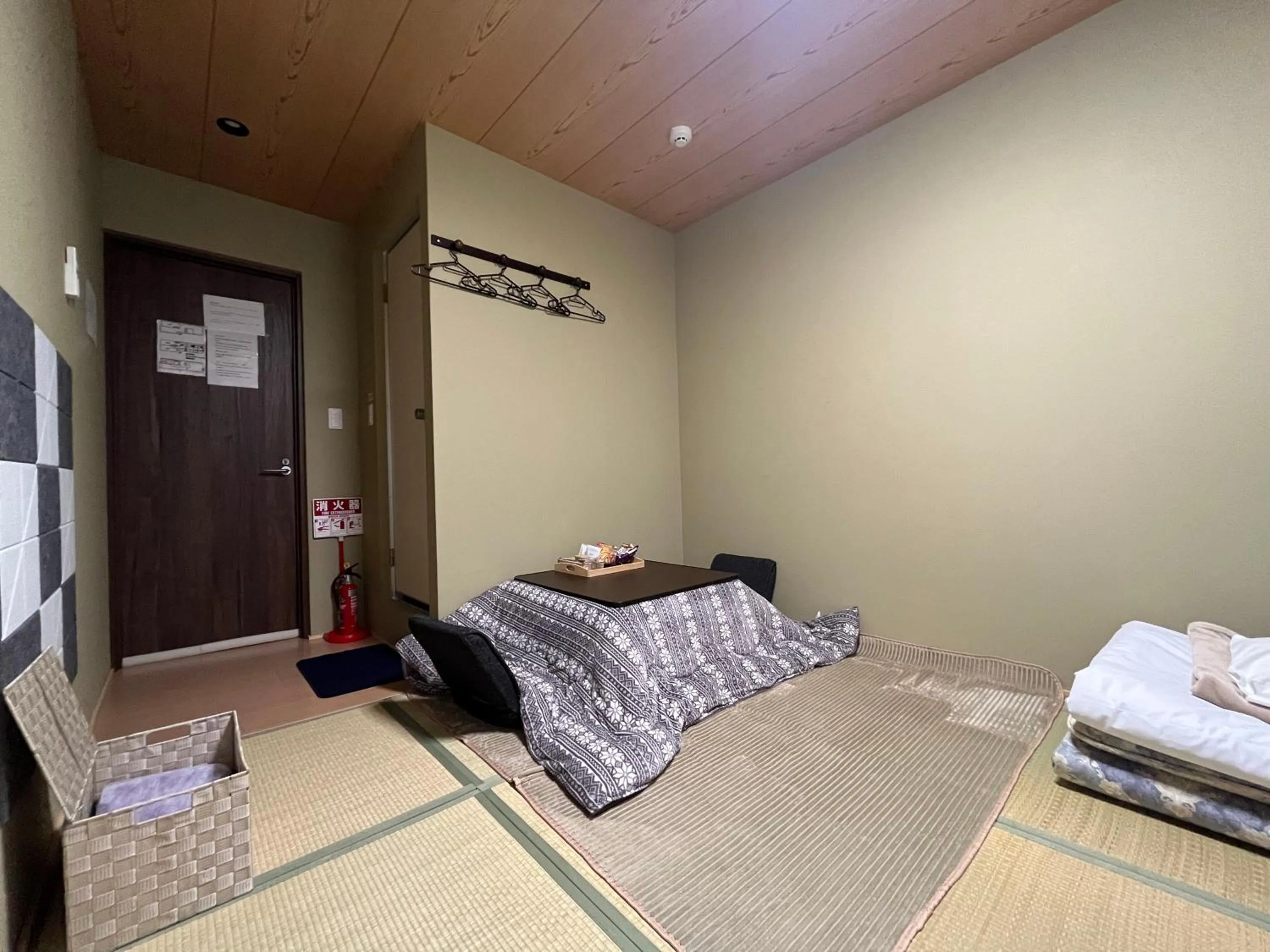 Bed in Wafu Ryokan Uehonmachi