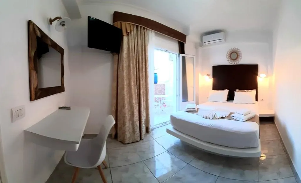 Bed in Atalos Suites