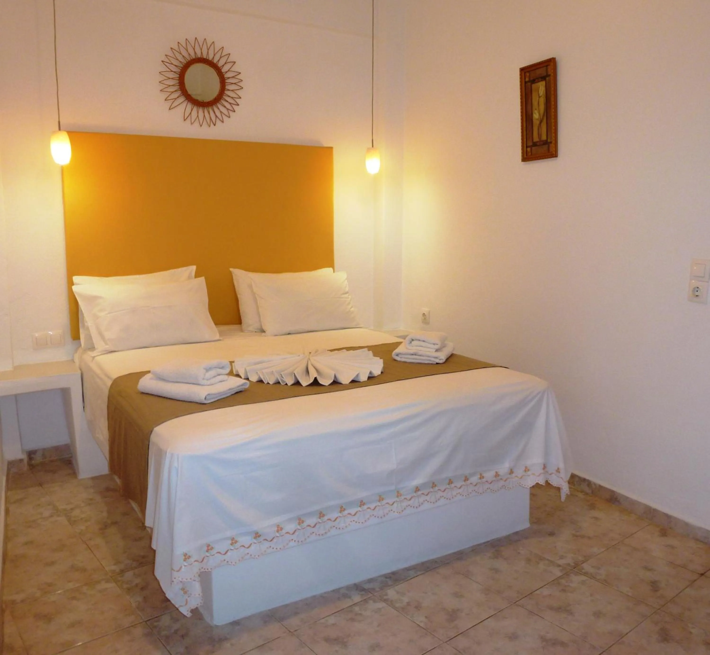 Bed in Atalos Suites