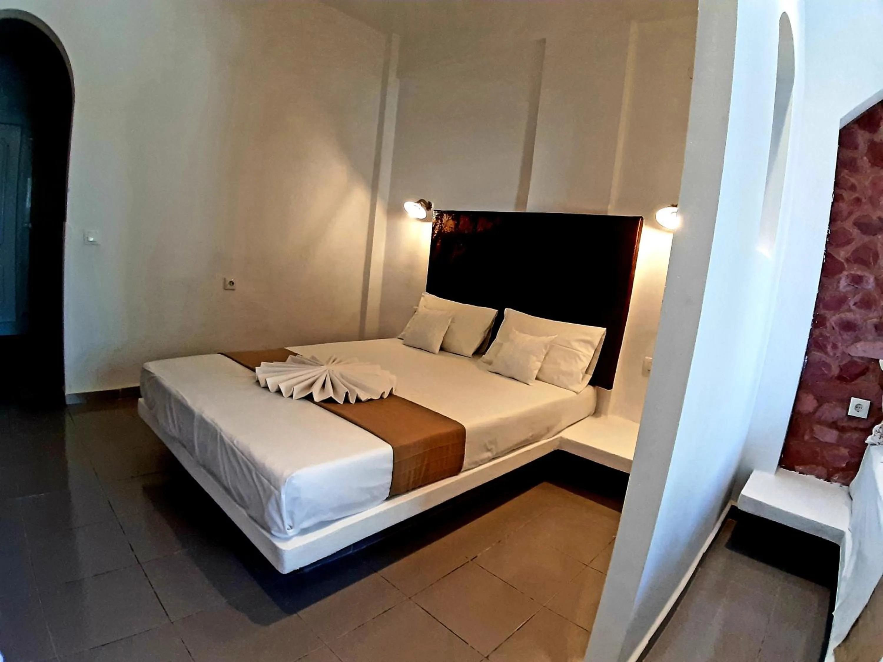 Bed in Atalos Suites