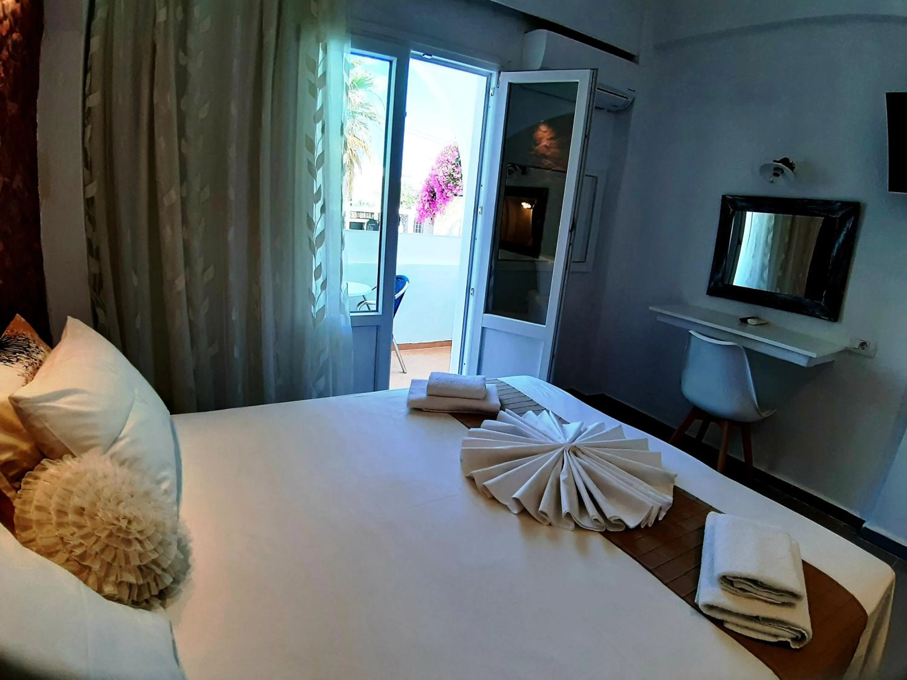 Bed in Atalos Suites