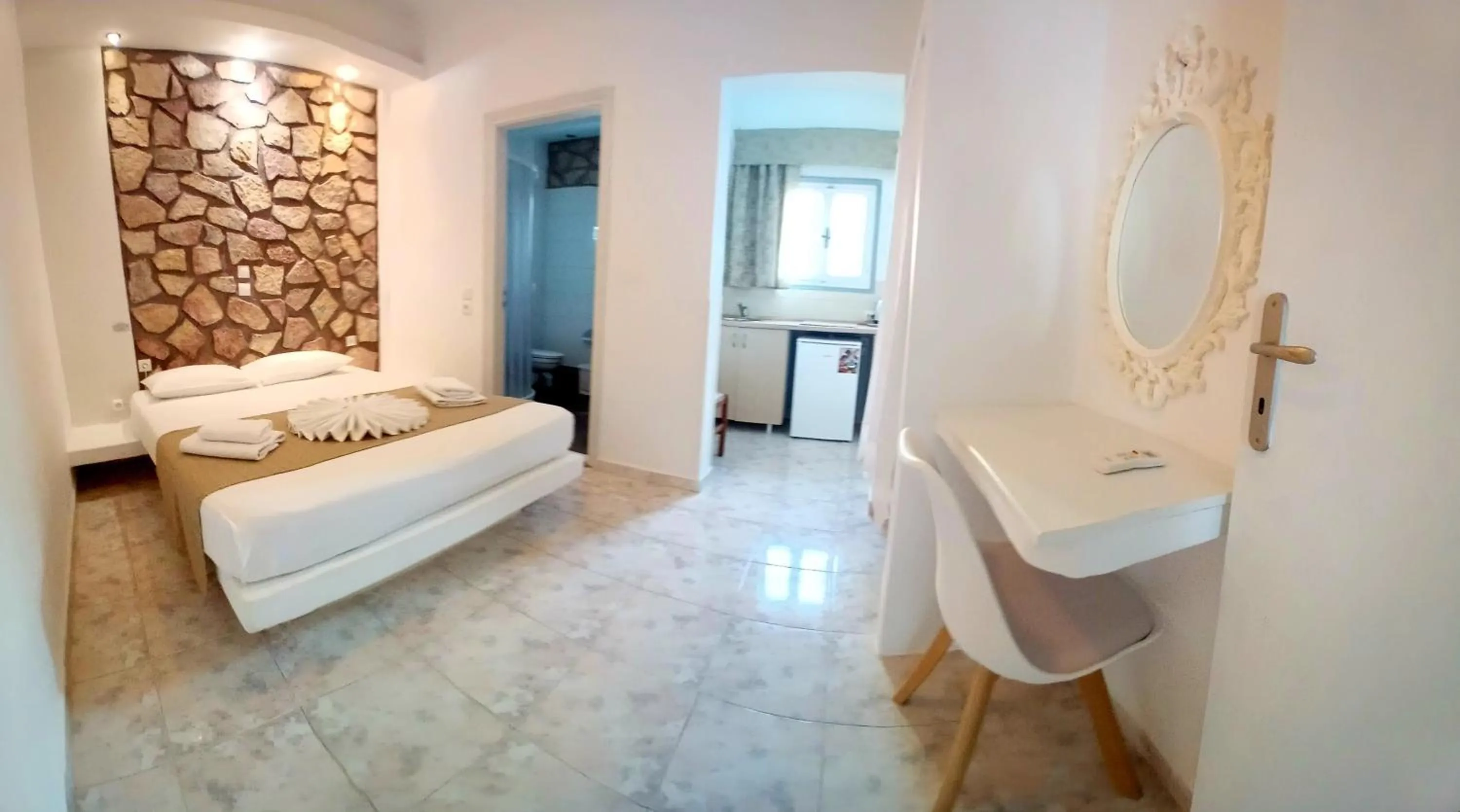 Bed in Atalos Suites