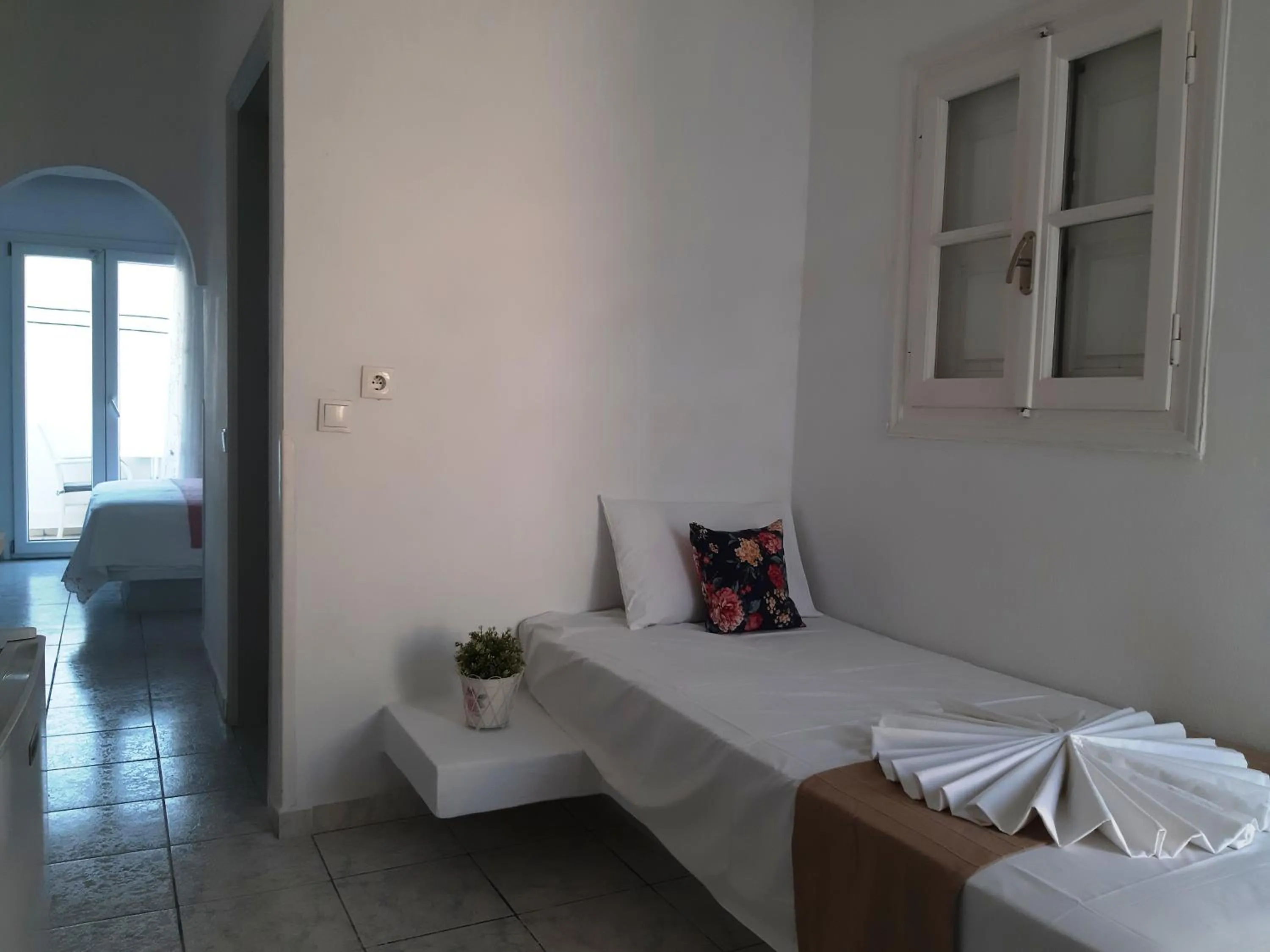 Bed in Atalos Suites