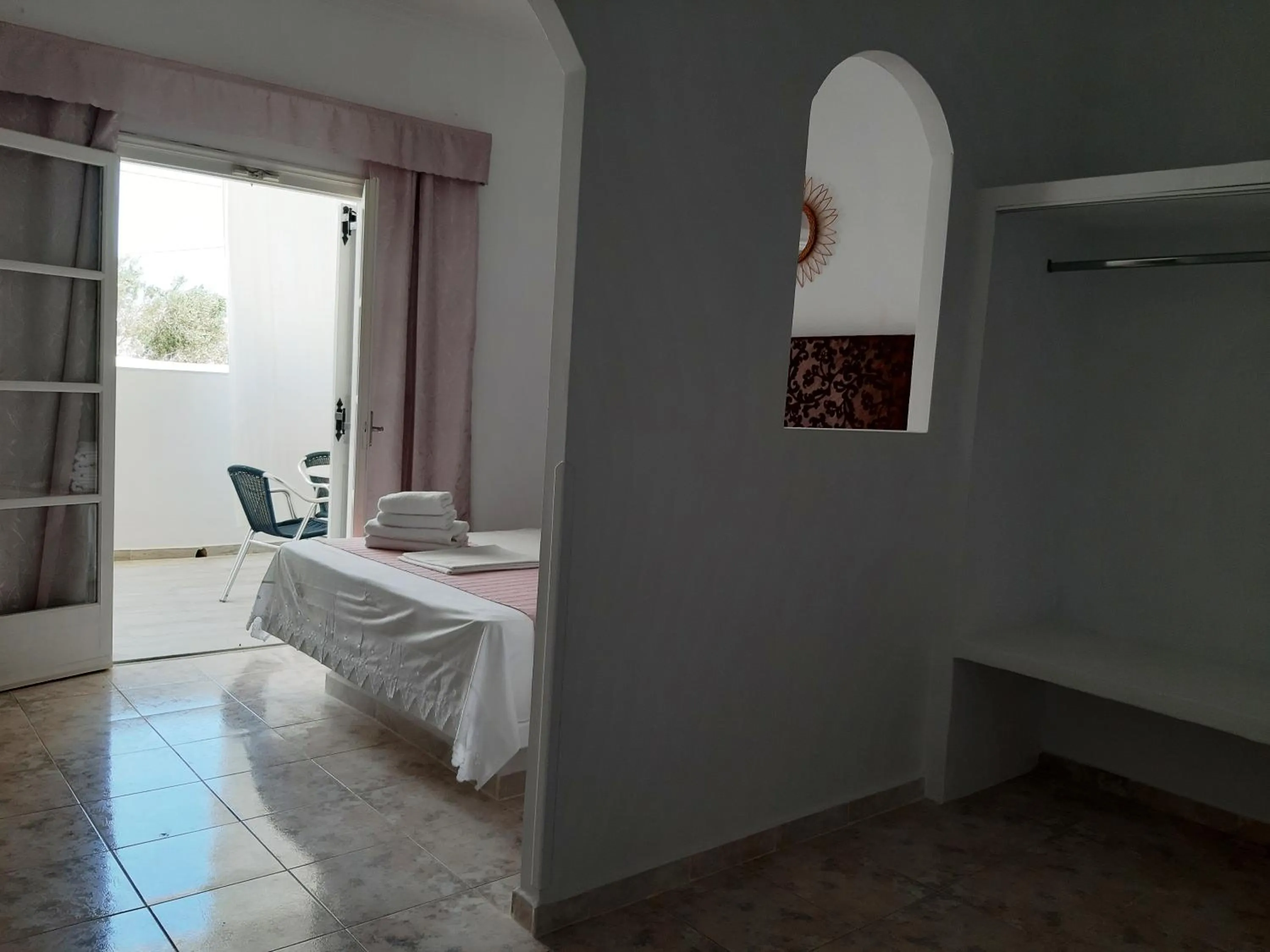 Bed in Atalos Suites