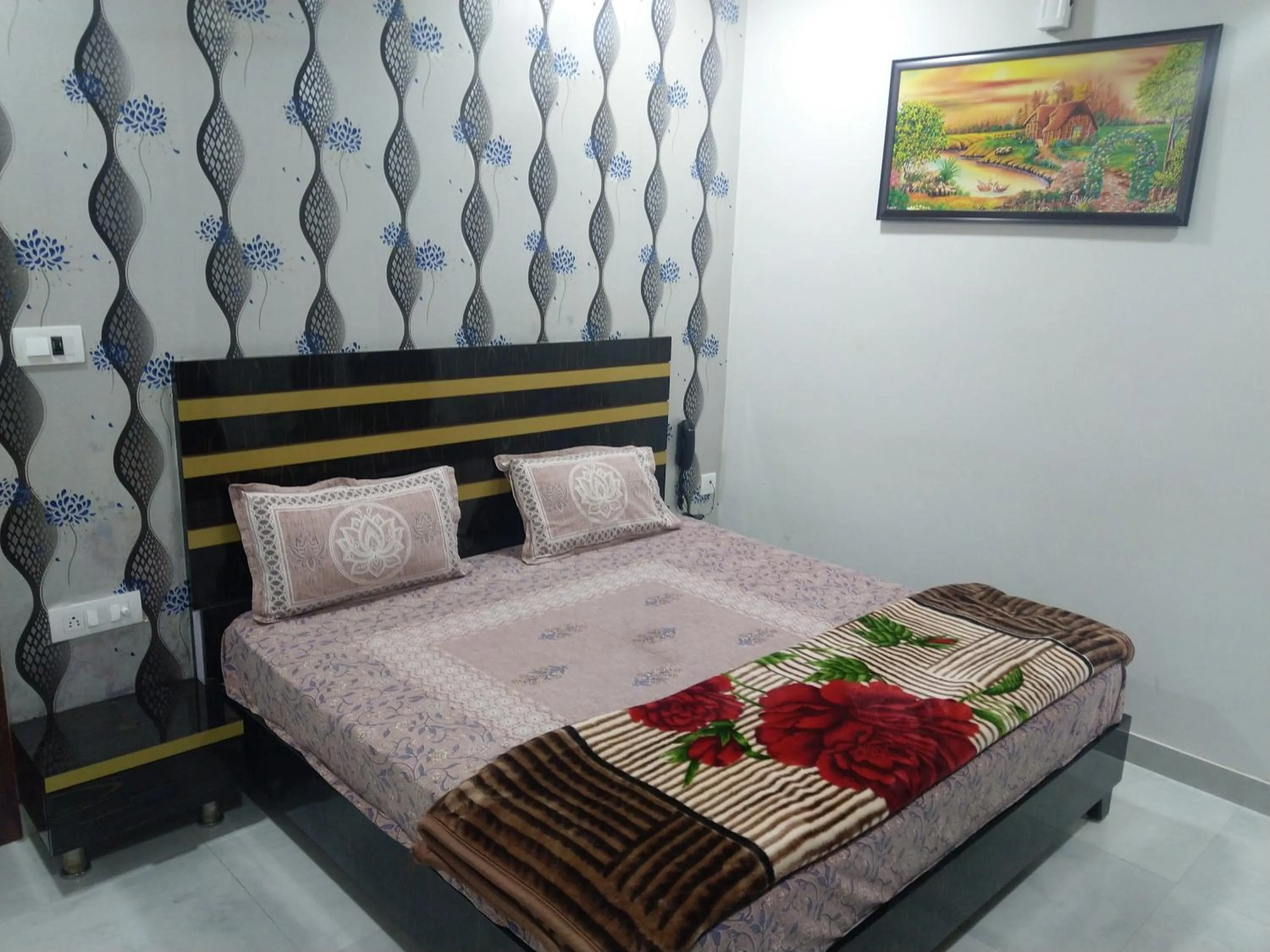 Bed in Hotel Imperial Crown