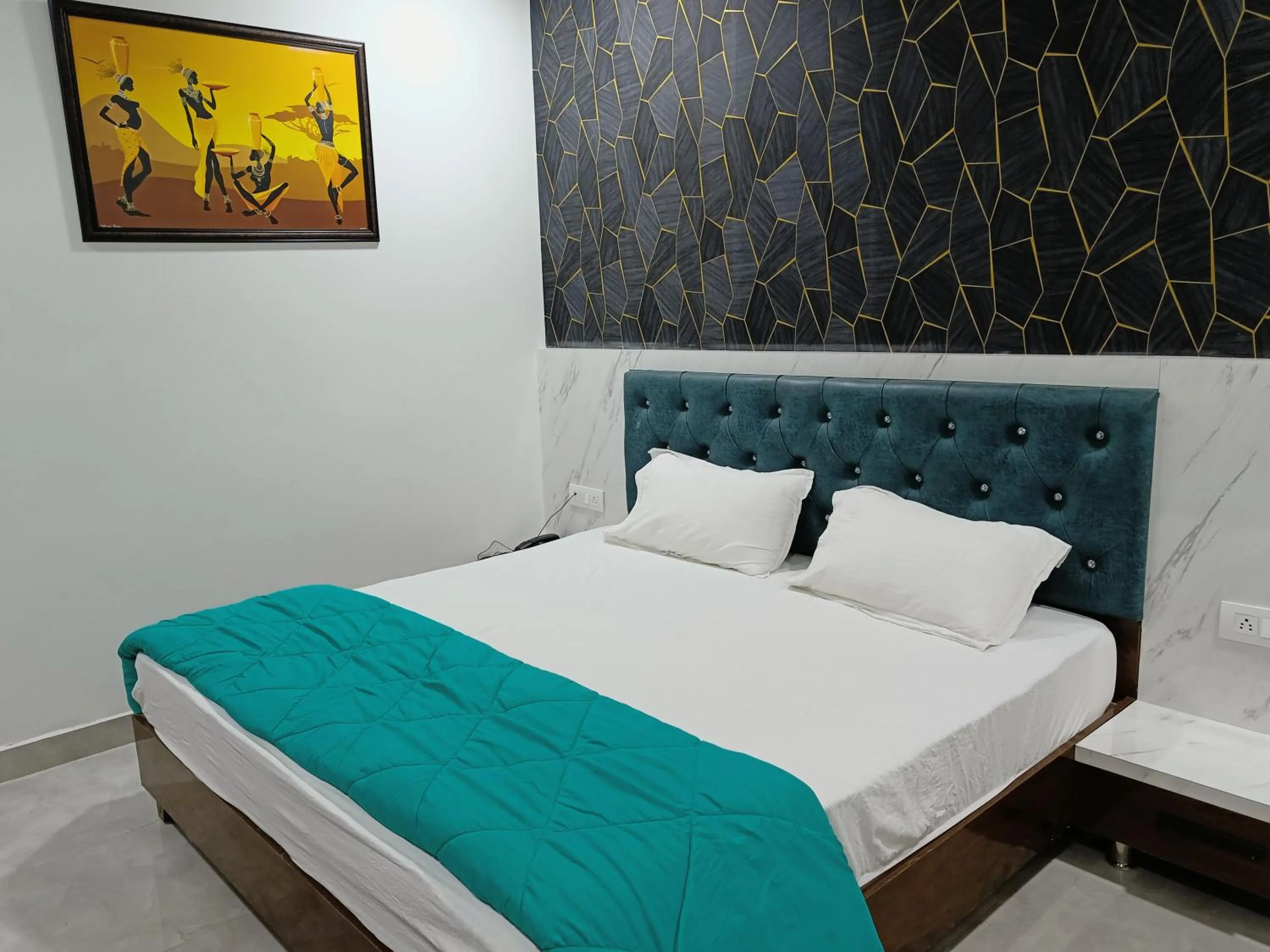 Bed in Hotel Imperial Crown