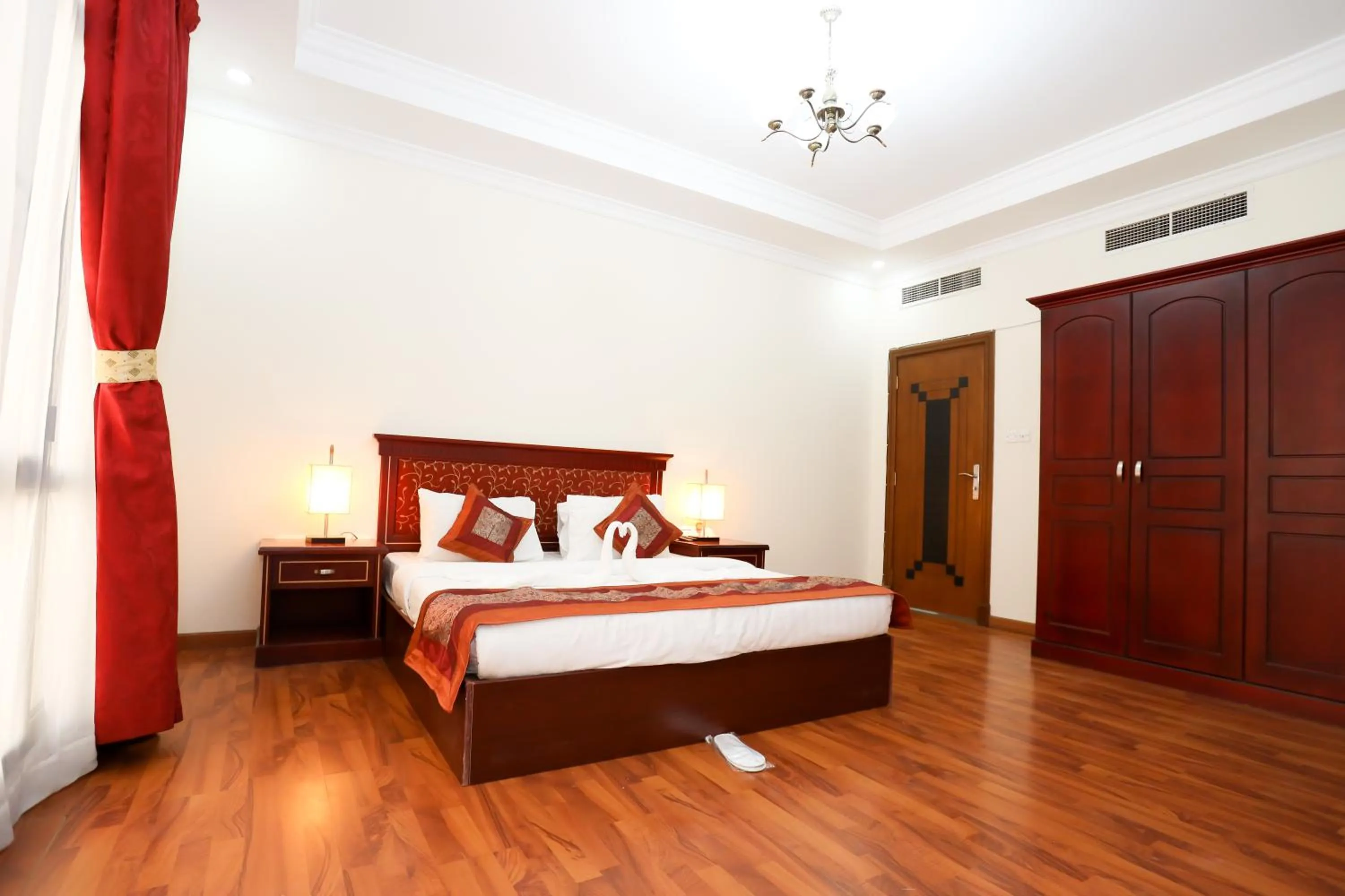 Bed in Pearl Bahrain Suites