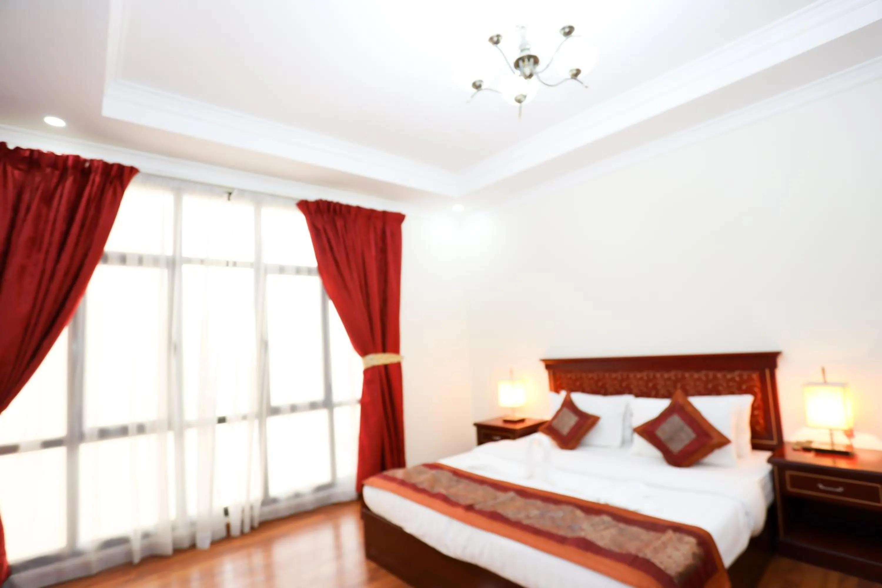 Bed in Pearl Bahrain Suites