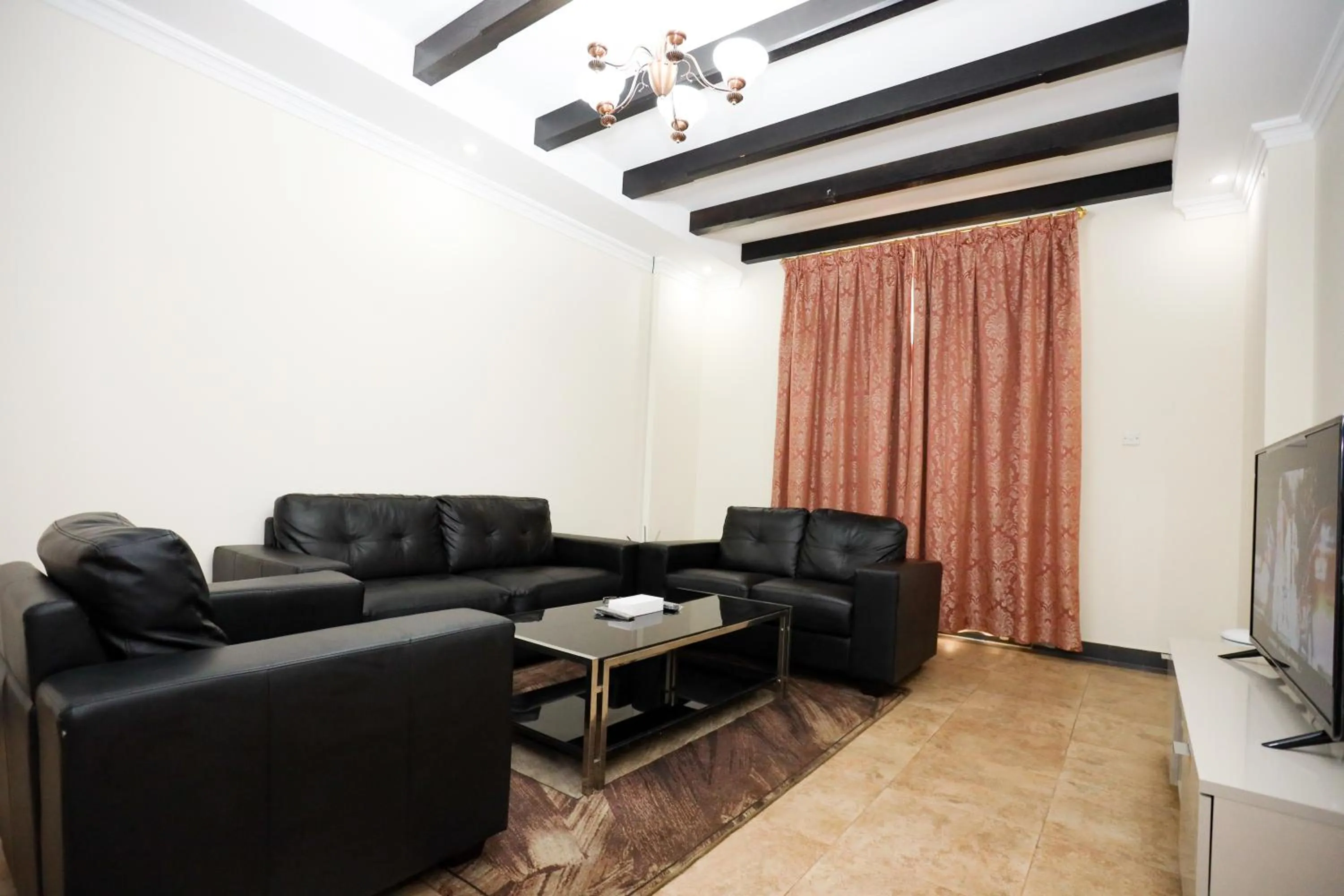Living room in Pearl Bahrain Suites