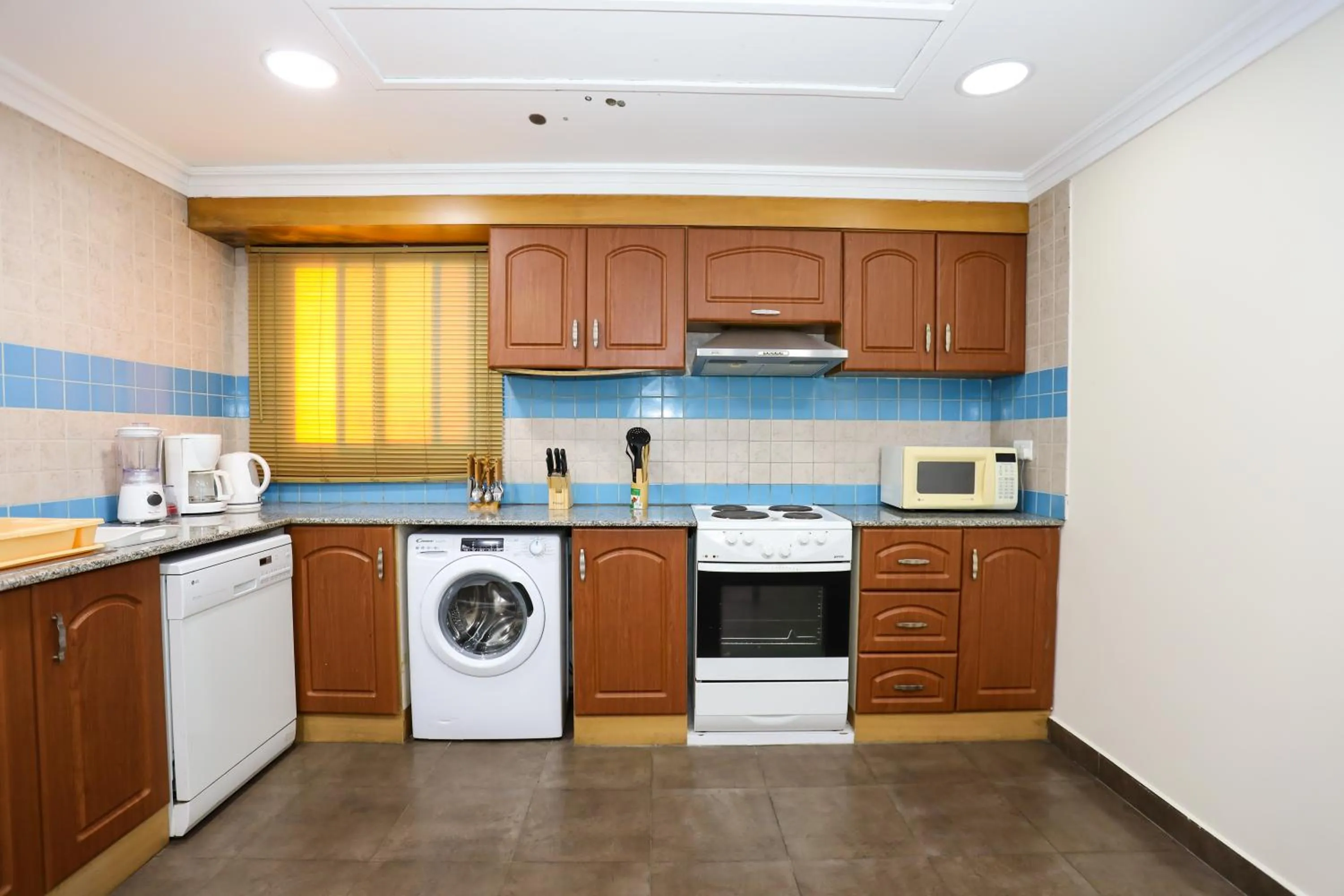 Kitchen or kitchenette in Pearl Bahrain Suites