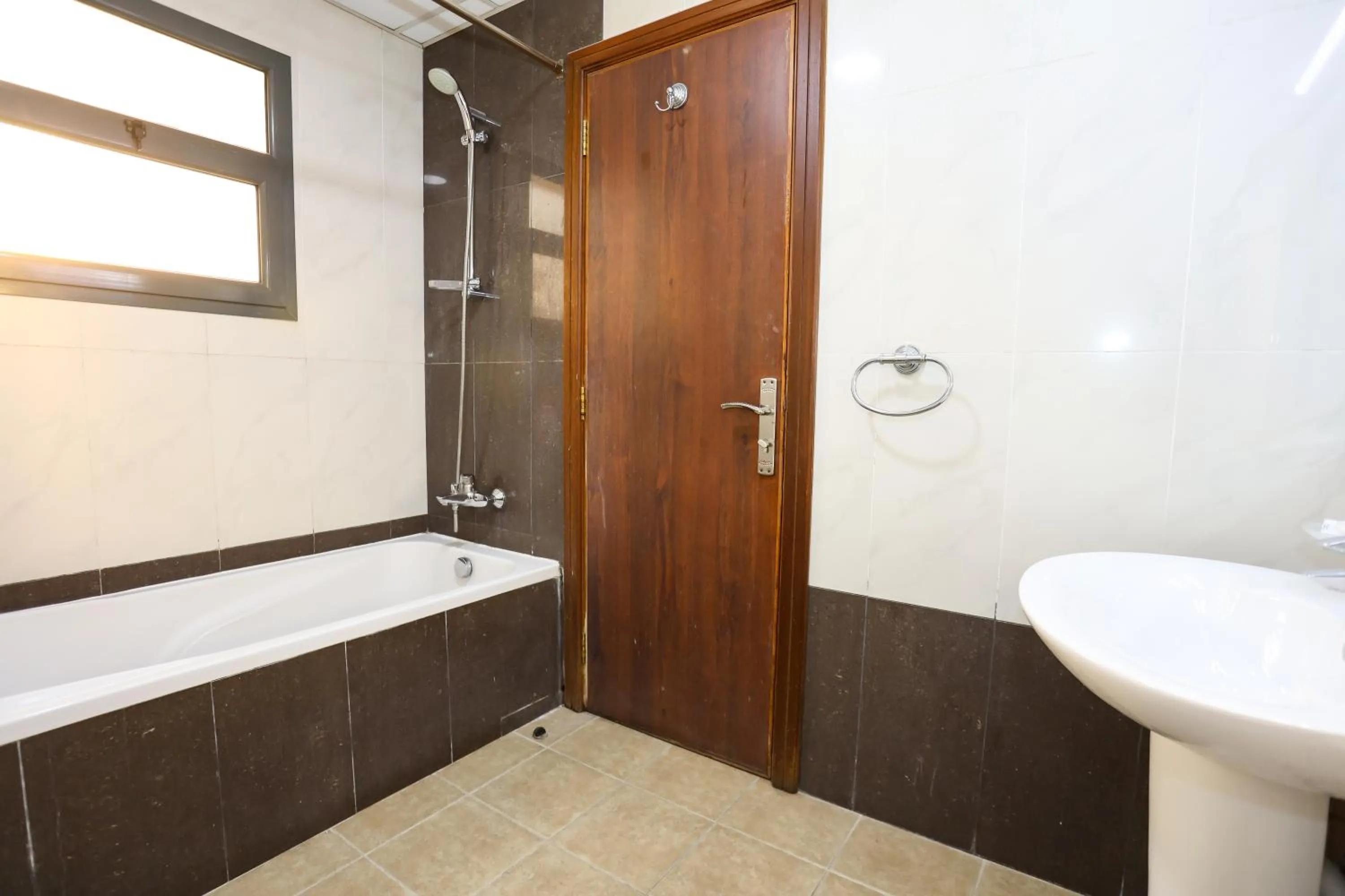 Toilet in Pearl Bahrain Suites