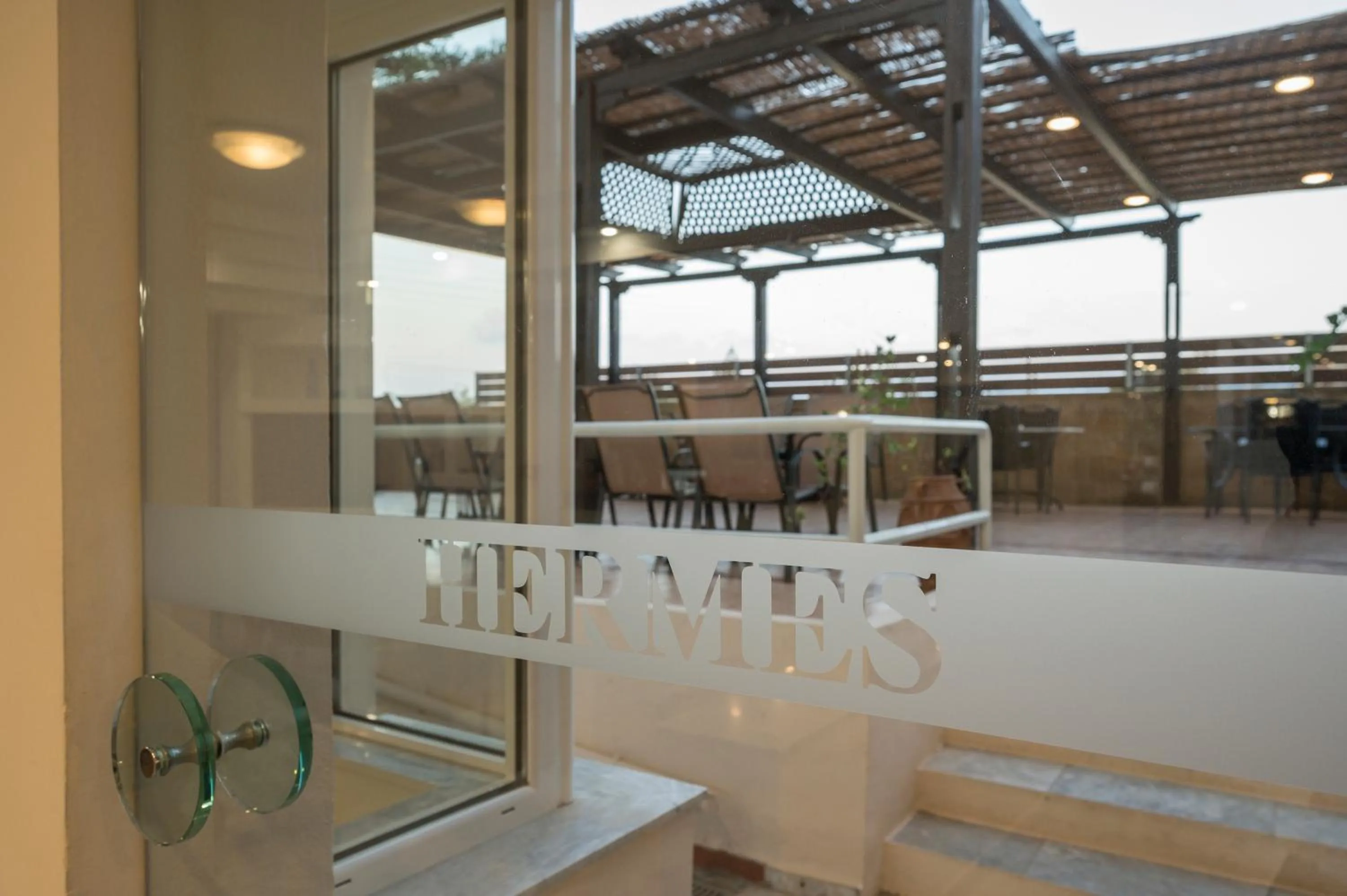 Property logo or sign in Hermes Hotel