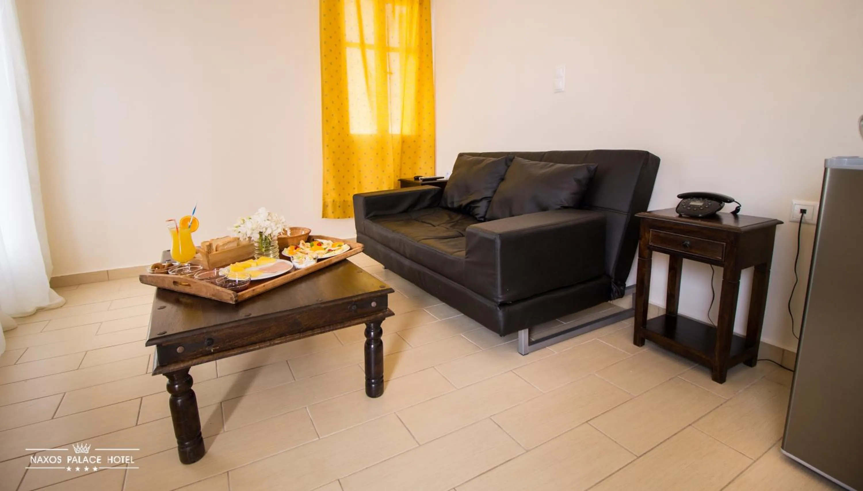 Living room in Naxos Palace Hotel