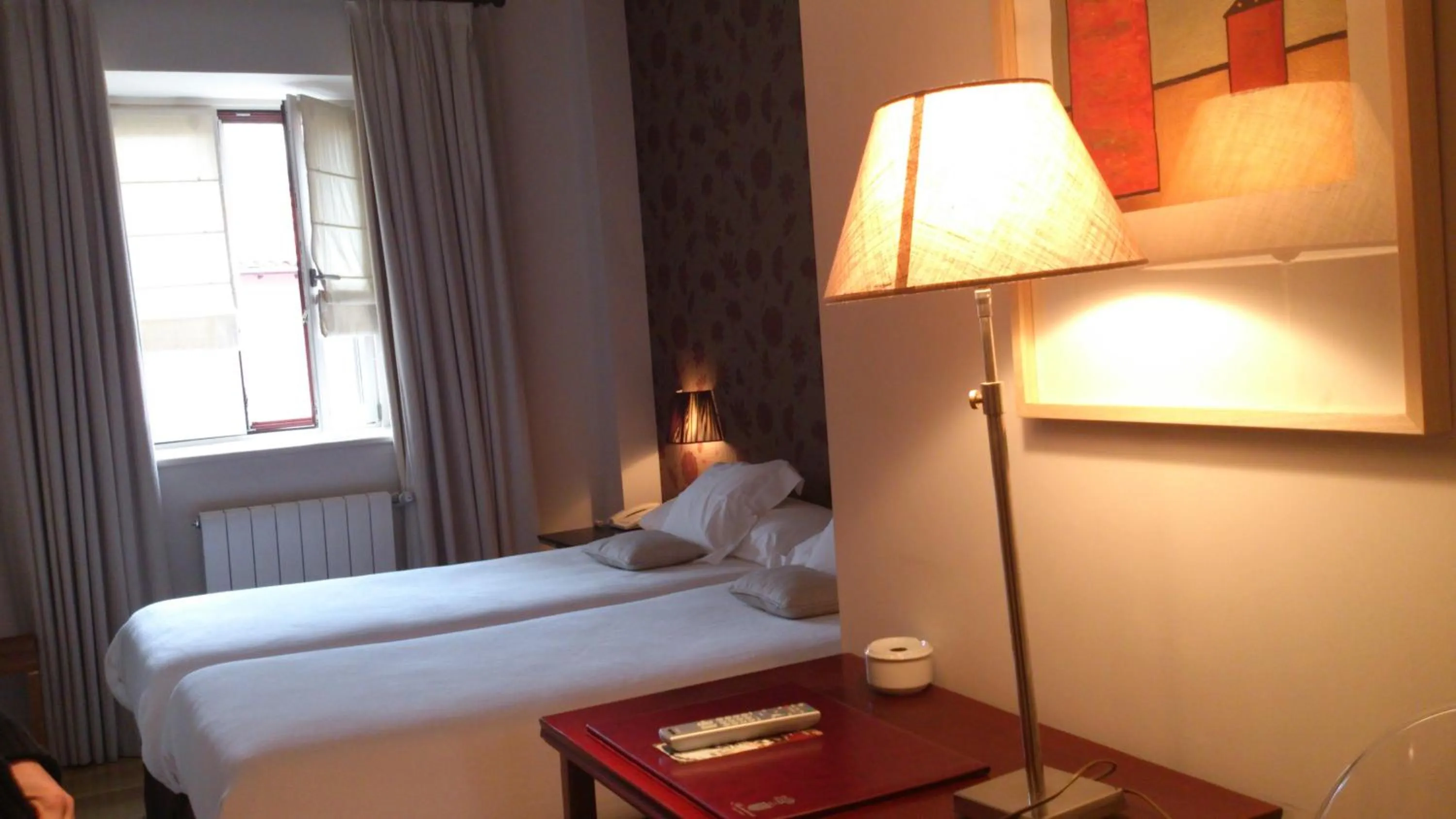 Bed in Hotel Palacio Muñatones