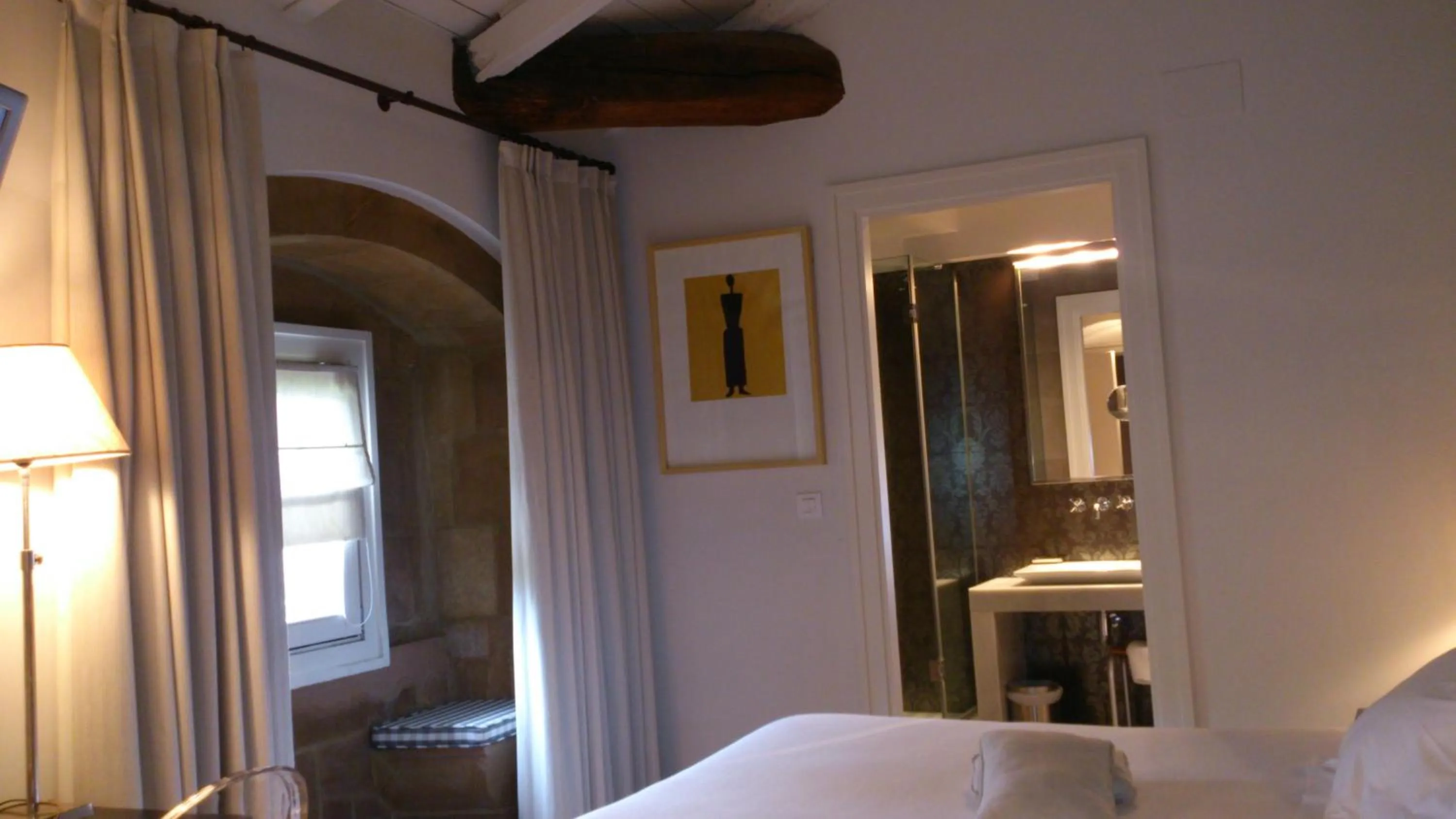 Bed in Hotel Palacio Muñatones