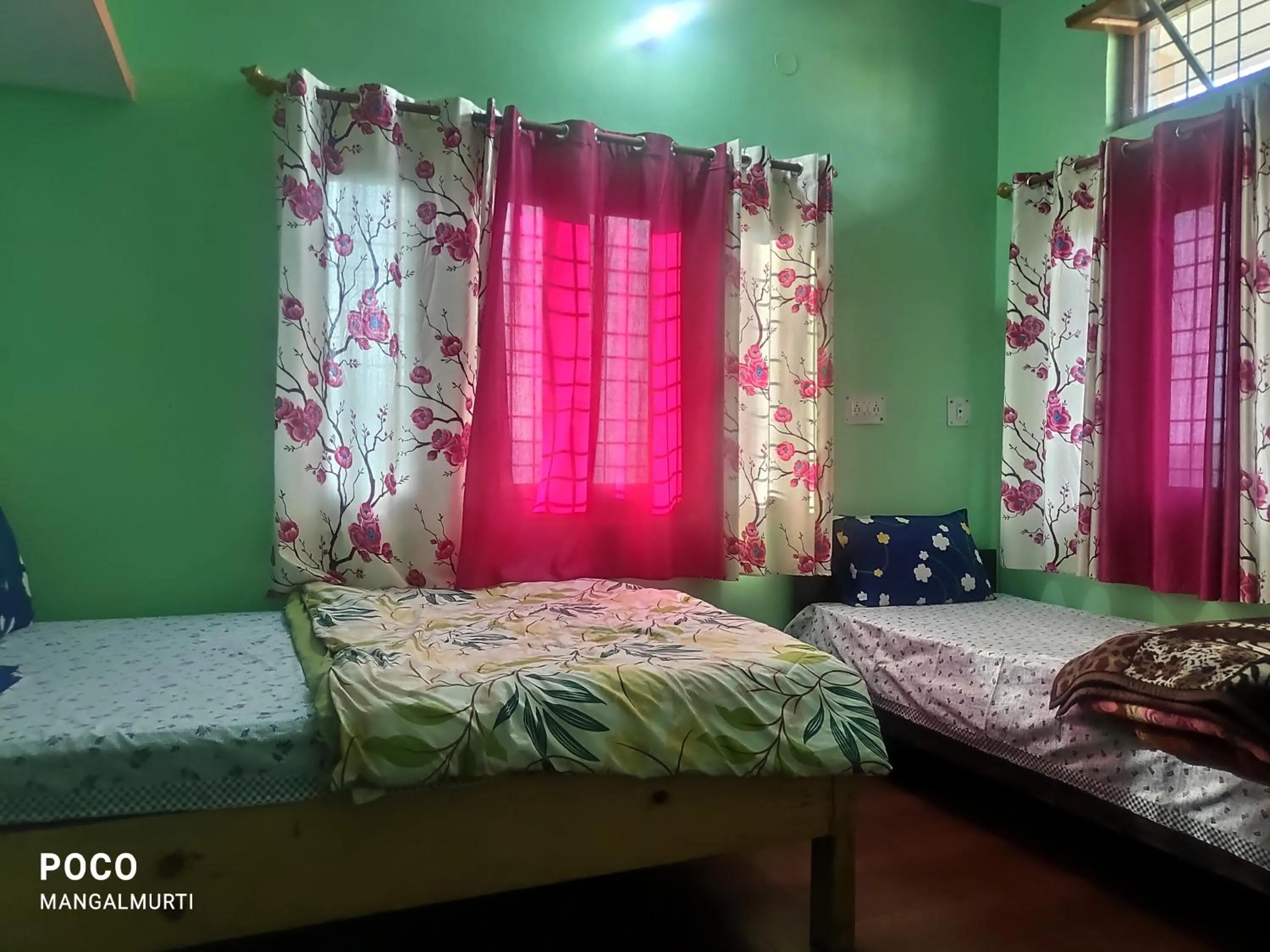 Bed in MangalMurti Himalyan Hotel